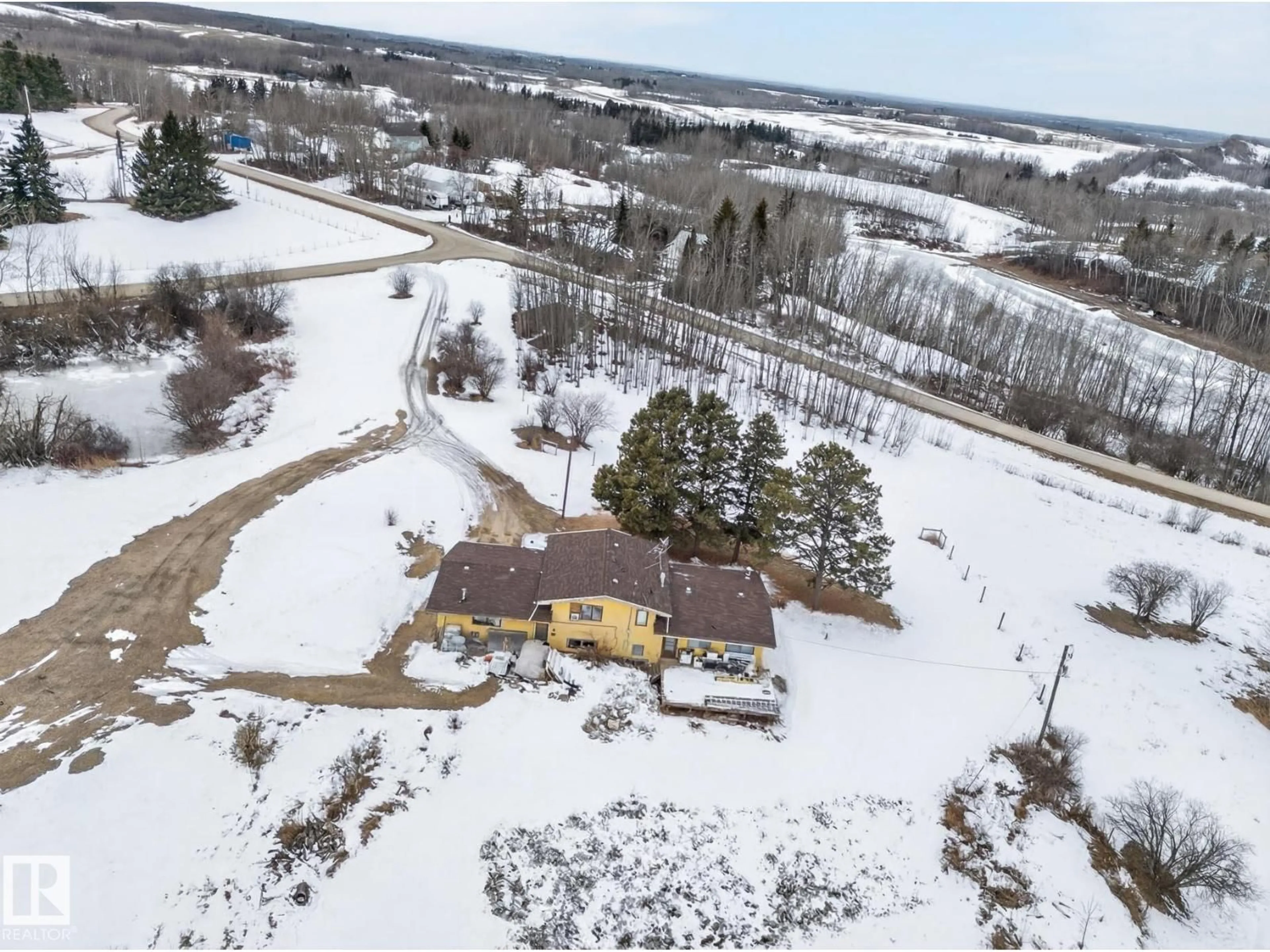 A pic from outside/outdoor area/front of a property/back of a property/a pic from drone, unknown for 14 - 53213 RGE ROAD 20, Rural Parkland County Alberta T0E0H0
