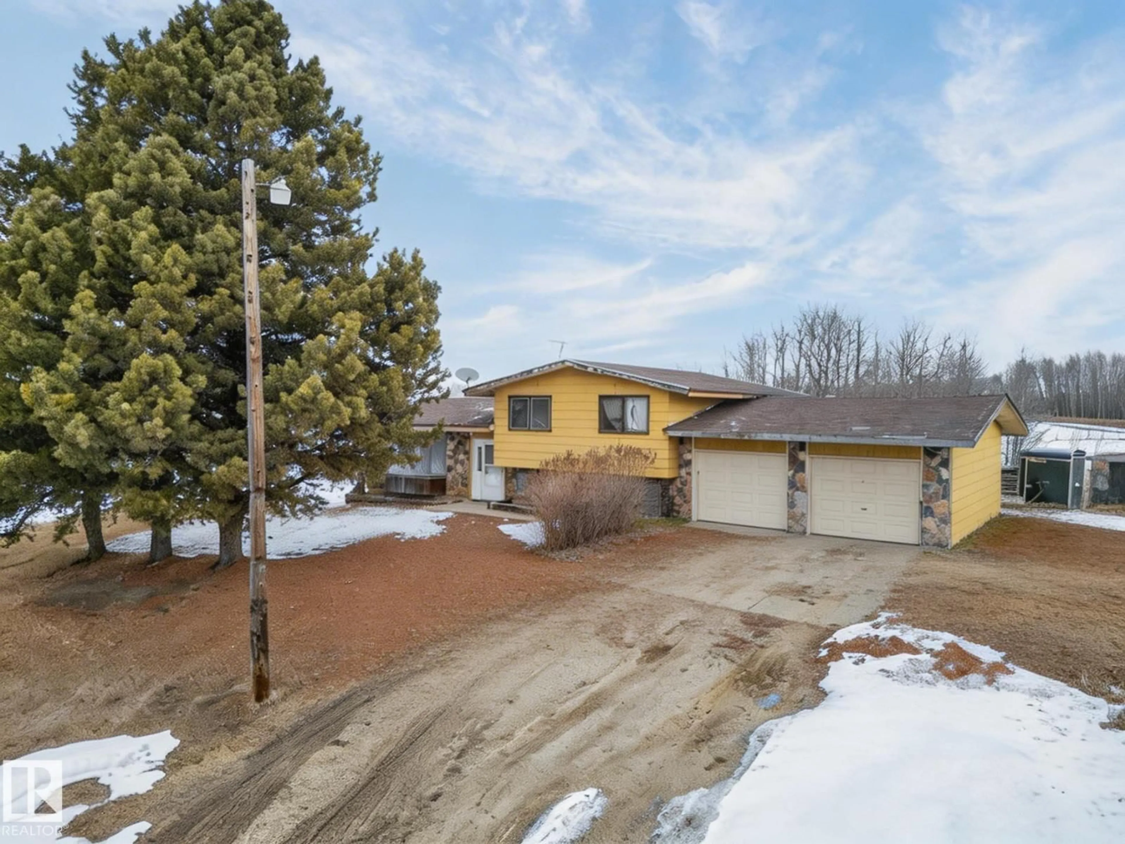 A pic from outside/outdoor area/front of a property/back of a property/a pic from drone, street for 14 - 53213 RGE ROAD 20, Rural Parkland County Alberta T0E0H0