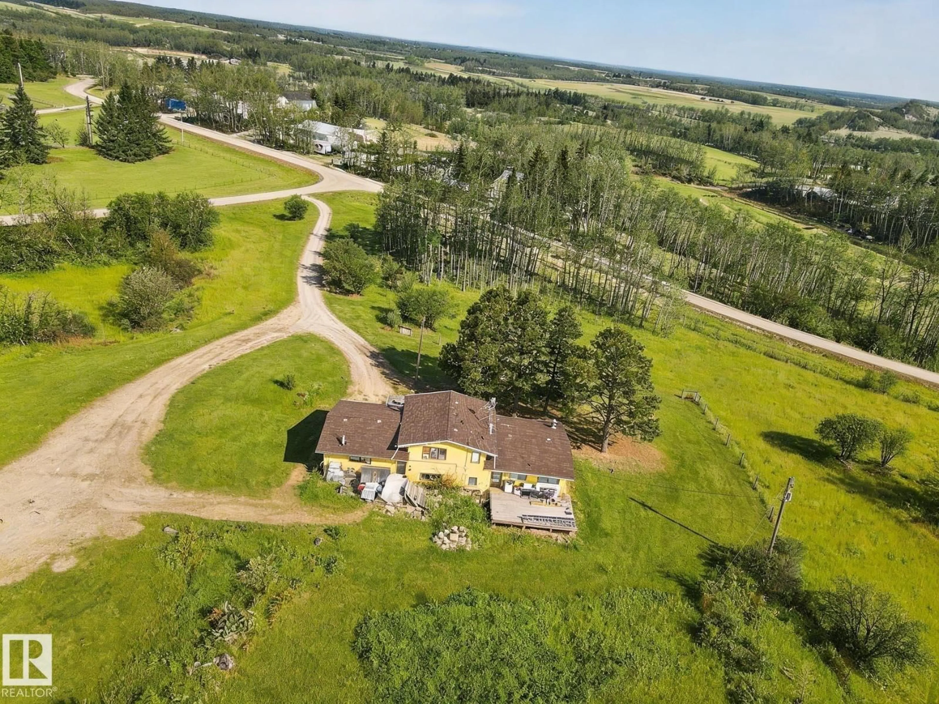 A pic from outside/outdoor area/front of a property/back of a property/a pic from drone, unknown for 14 - 53213 RGE ROAD 20, Rural Parkland County Alberta T0E0H0
