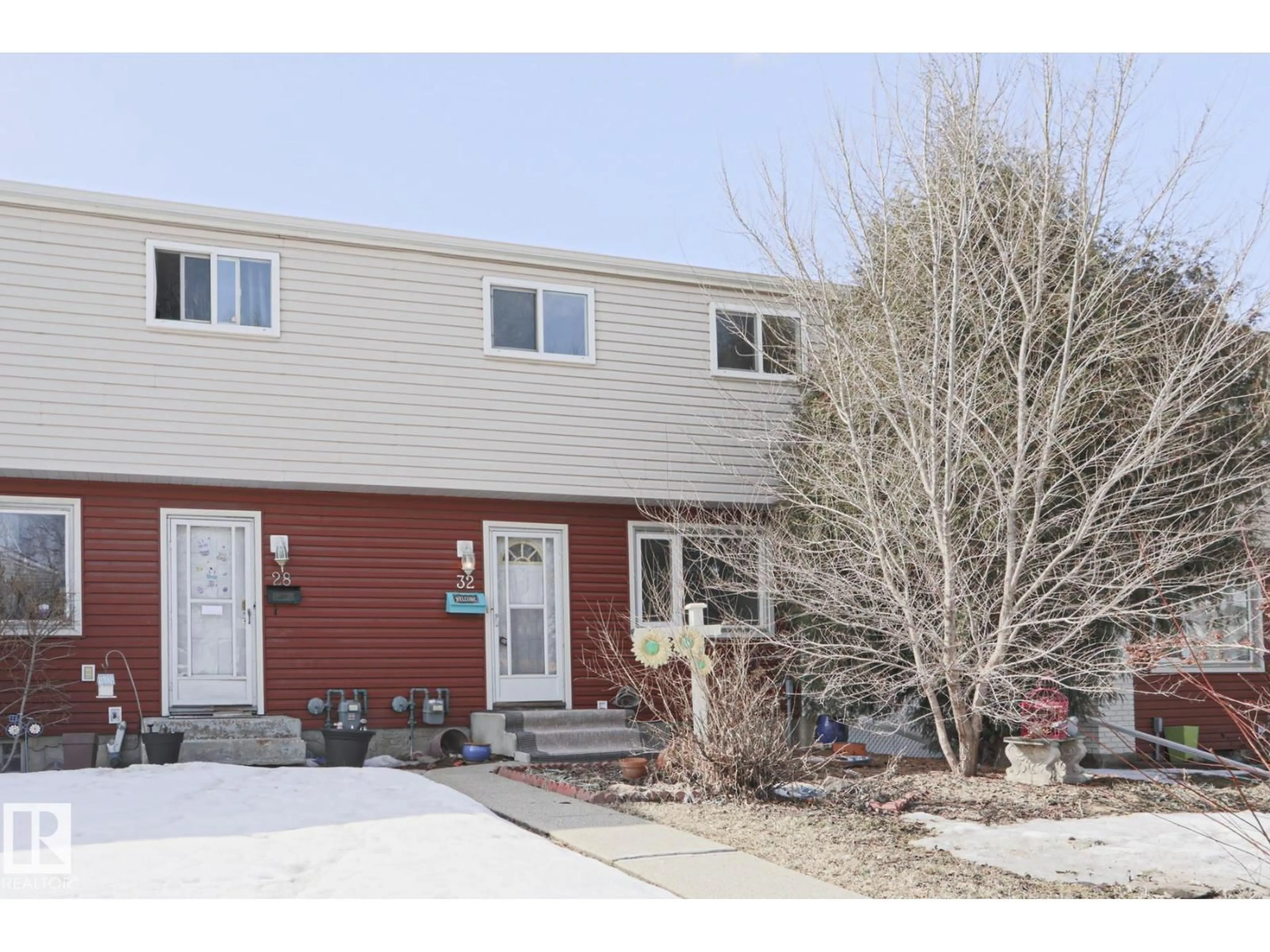 Home with vinyl exterior material, street for 32 HABITAT CR, Edmonton Alberta T5A2X7