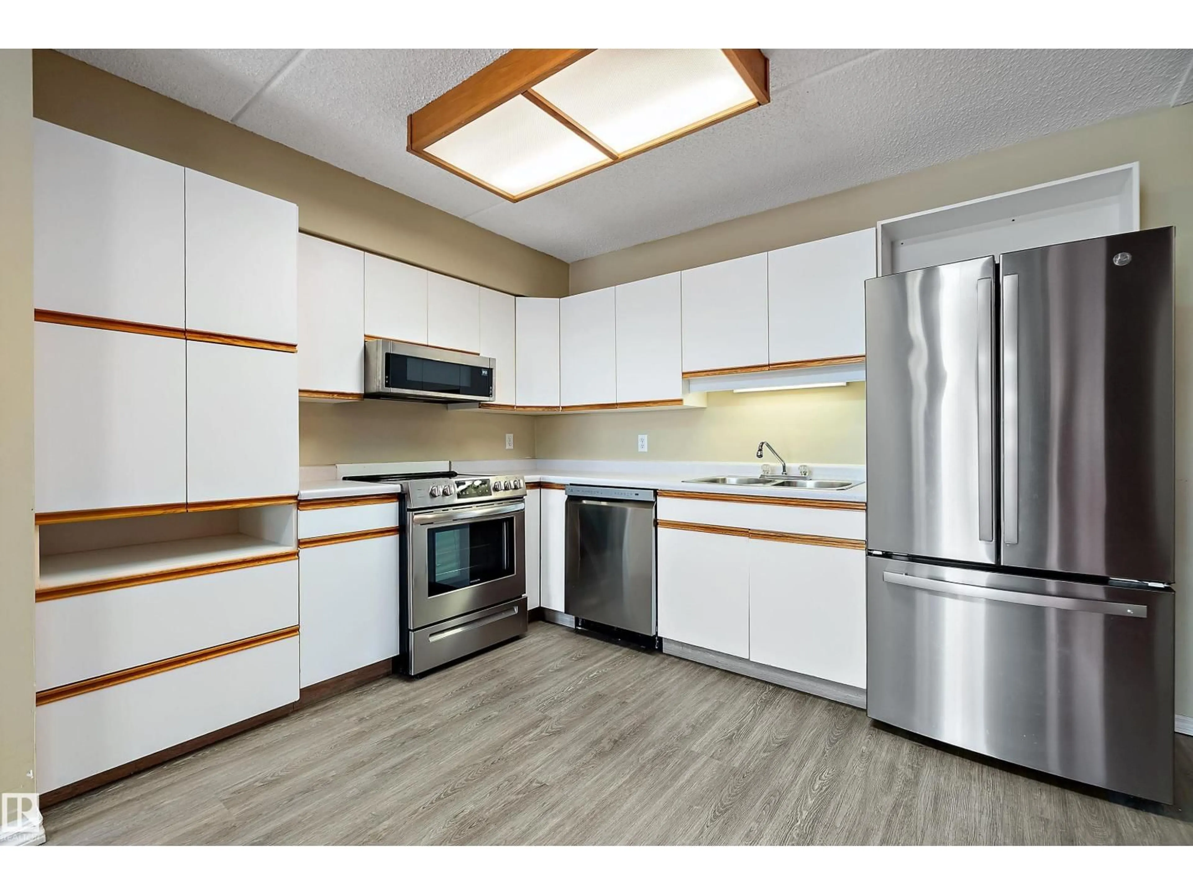 Standard kitchen, wood/laminate floor for 201 - 4906 47 AV, Leduc Alberta T9E6R7