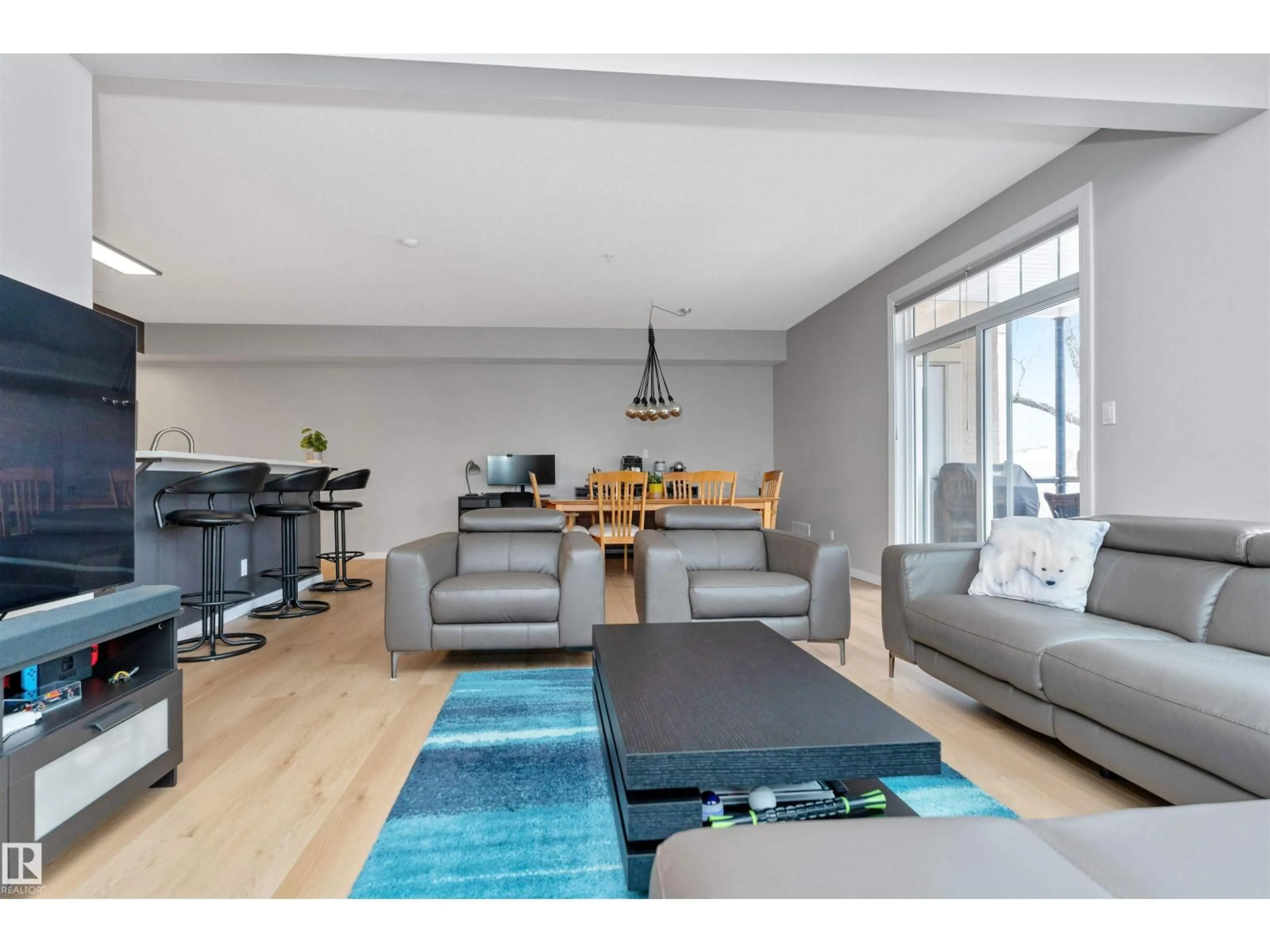 Living room with furniture, wood/laminate floor for #303 - 9828 112 ST NW, Edmonton Alberta T5K1L4