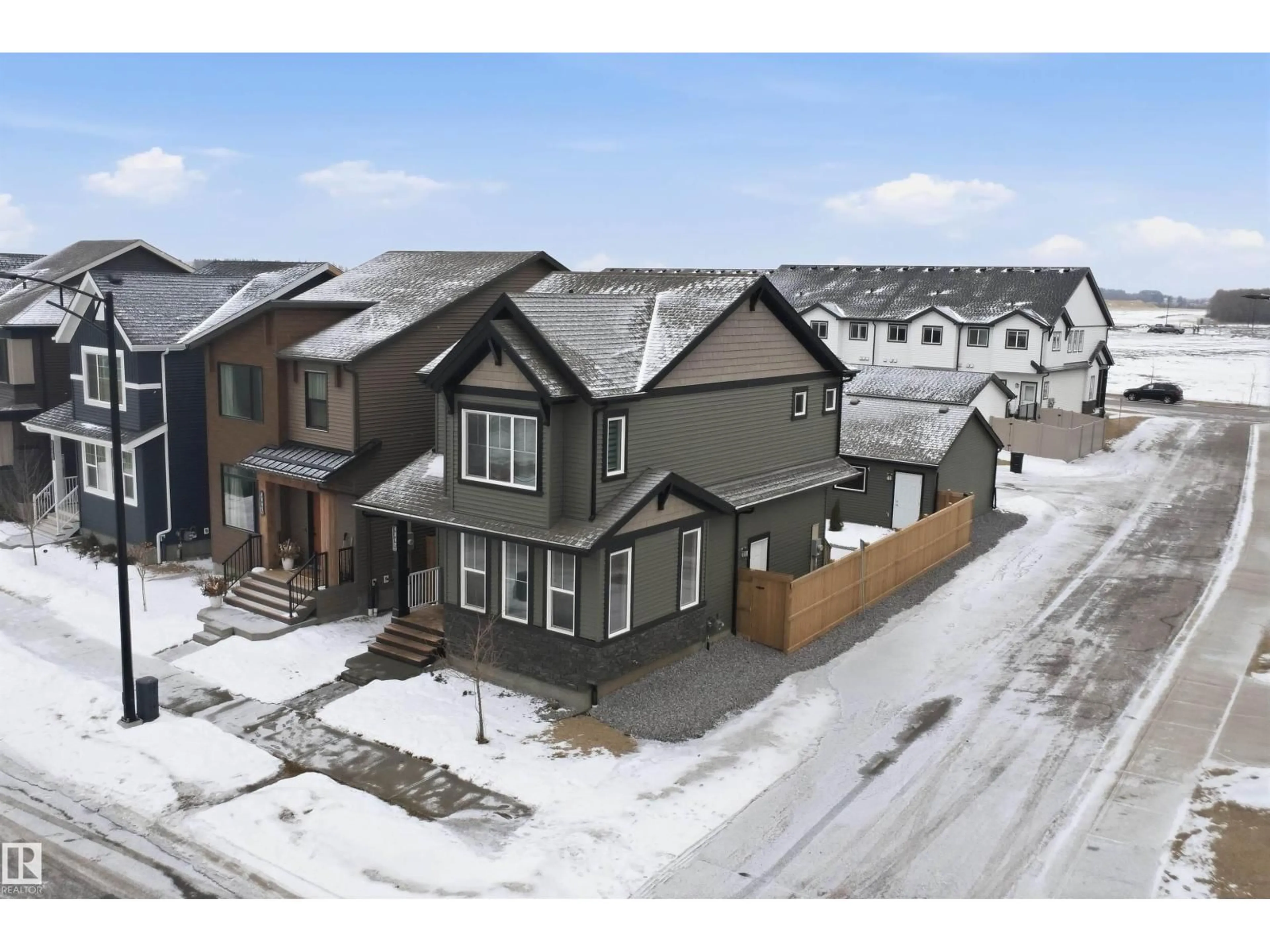 A pic from outside/outdoor area/front of a property/back of a property/a pic from drone, street for LI SW - 4047 HAWTHORN LINK, Edmonton Alberta T6X2Y8