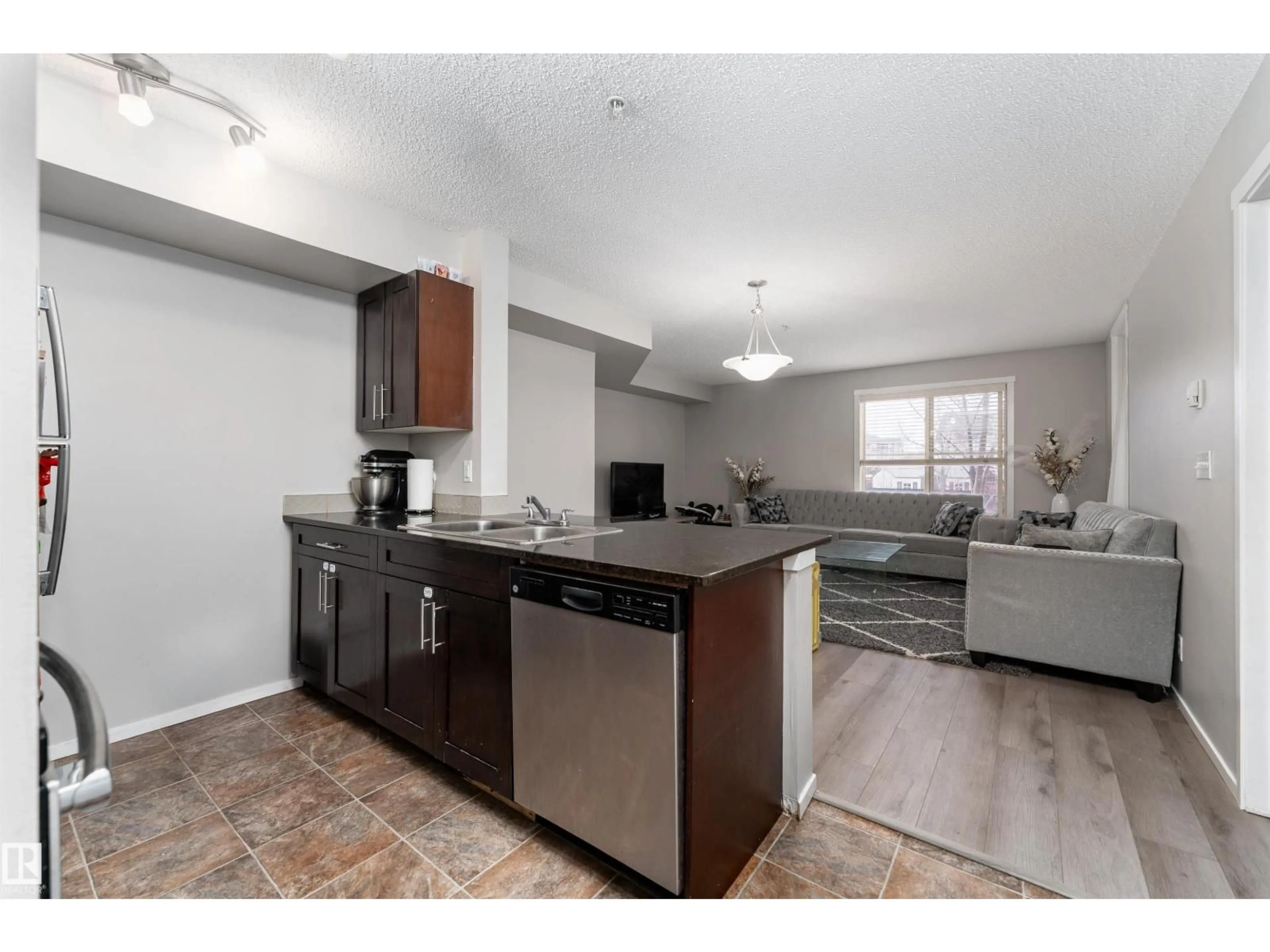 Open concept kitchen, unknown for 117 - 3207 JAMES MOWATT TR, Edmonton Alberta T6W3L6