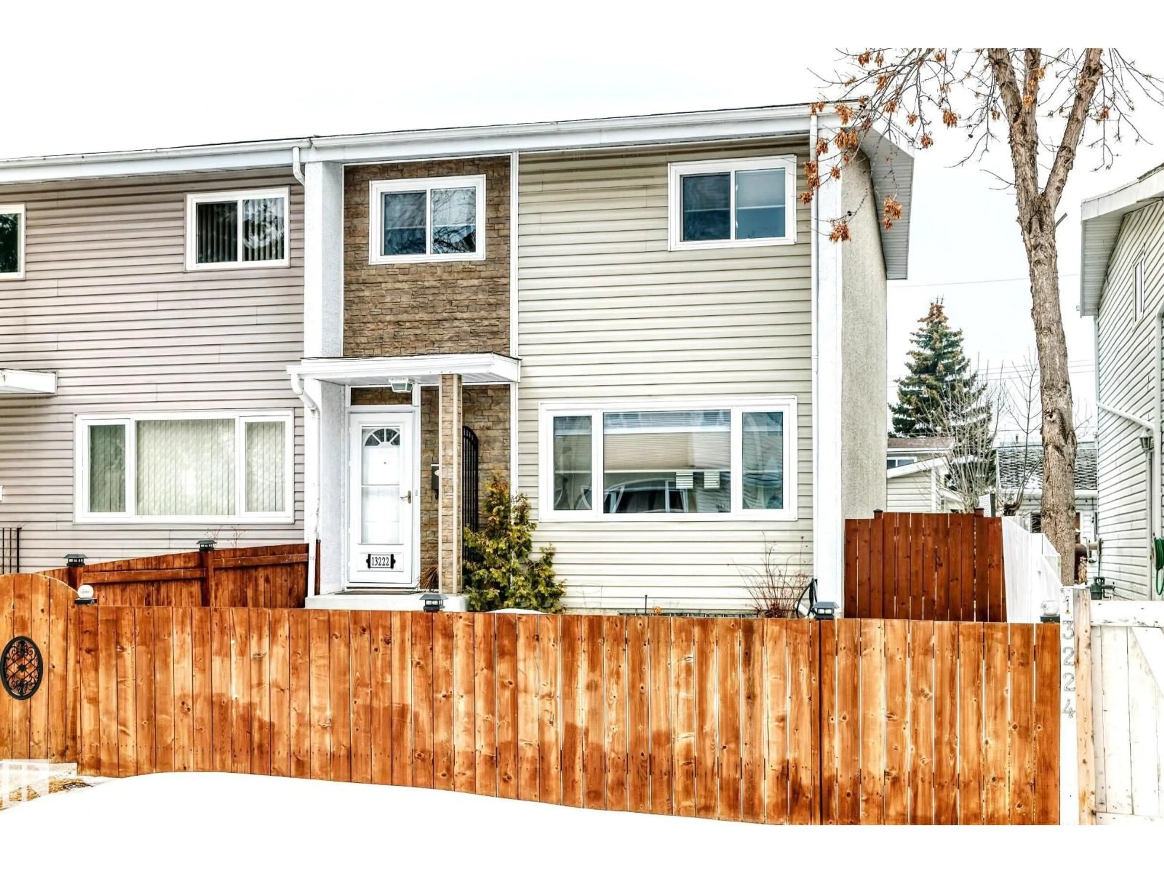 Home with vinyl exterior material, street for 13222 83 ST, Edmonton Alberta T5E2W7