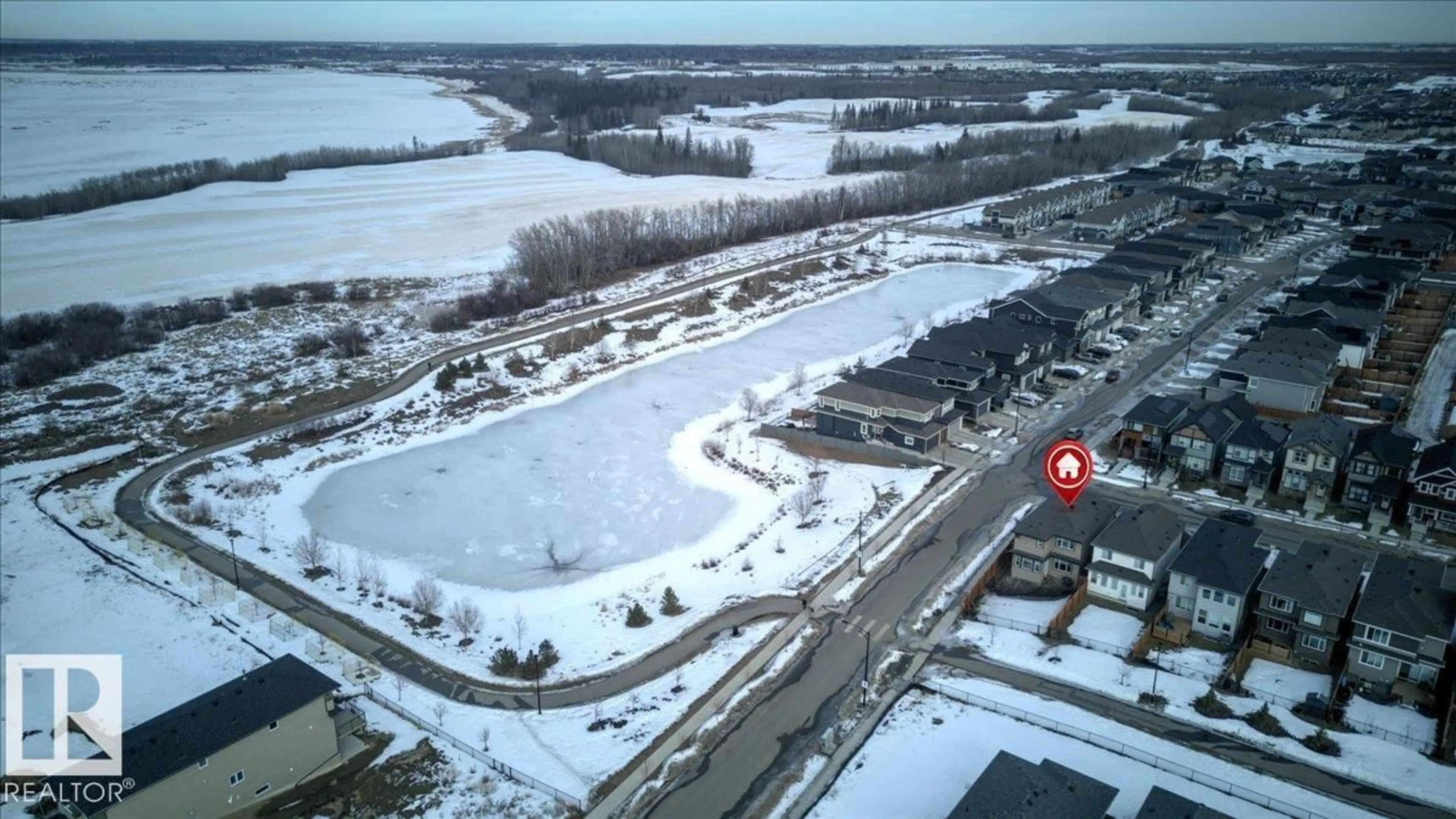 A pic from outside/outdoor area/front of a property/back of a property/a pic from drone, water/lake/river/ocean view for NW - 13072 211 ST, Edmonton Alberta T5S0P5