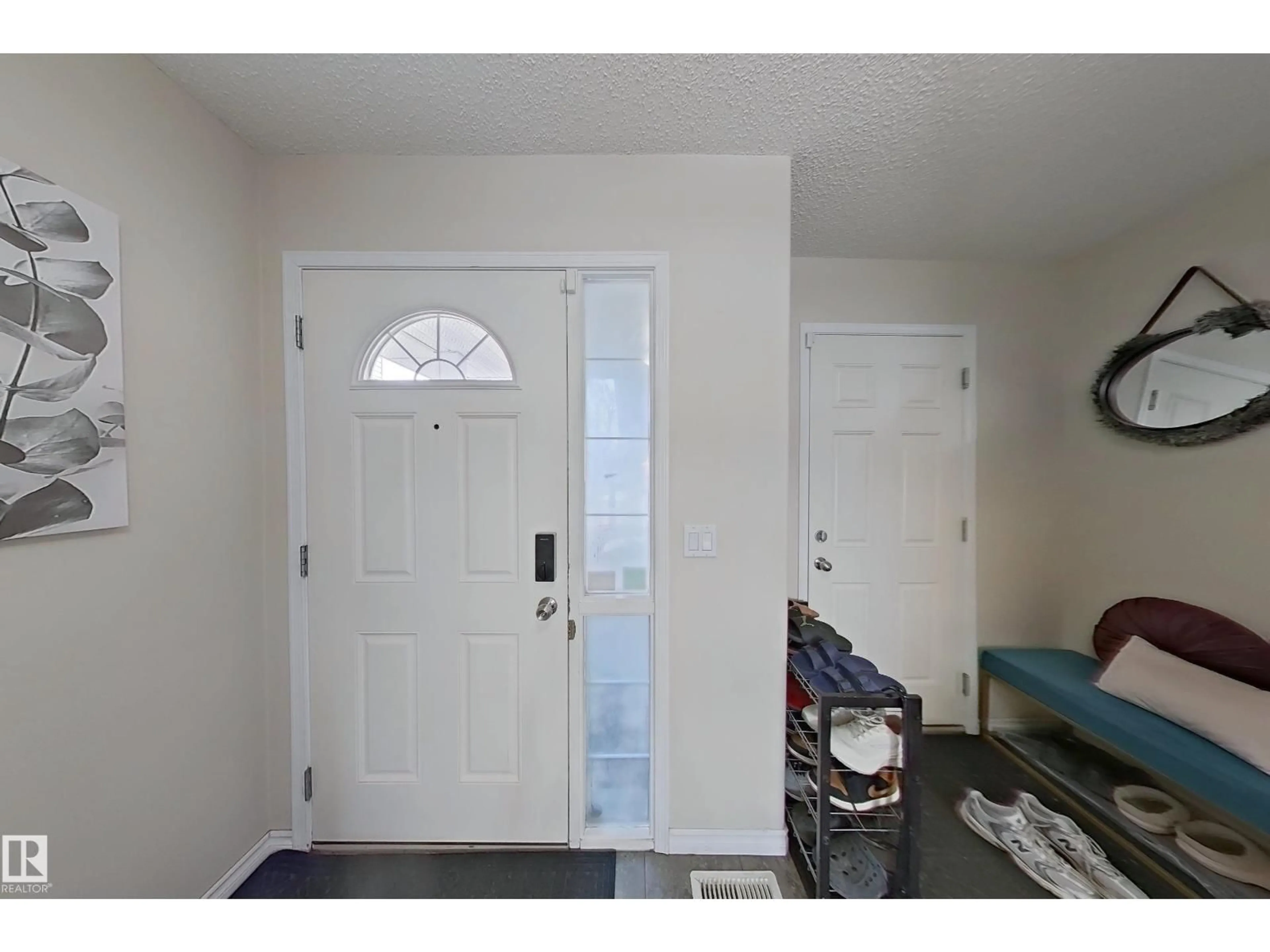 Indoor entryway for 3120 25 AV, Edmonton Alberta T6T0L8