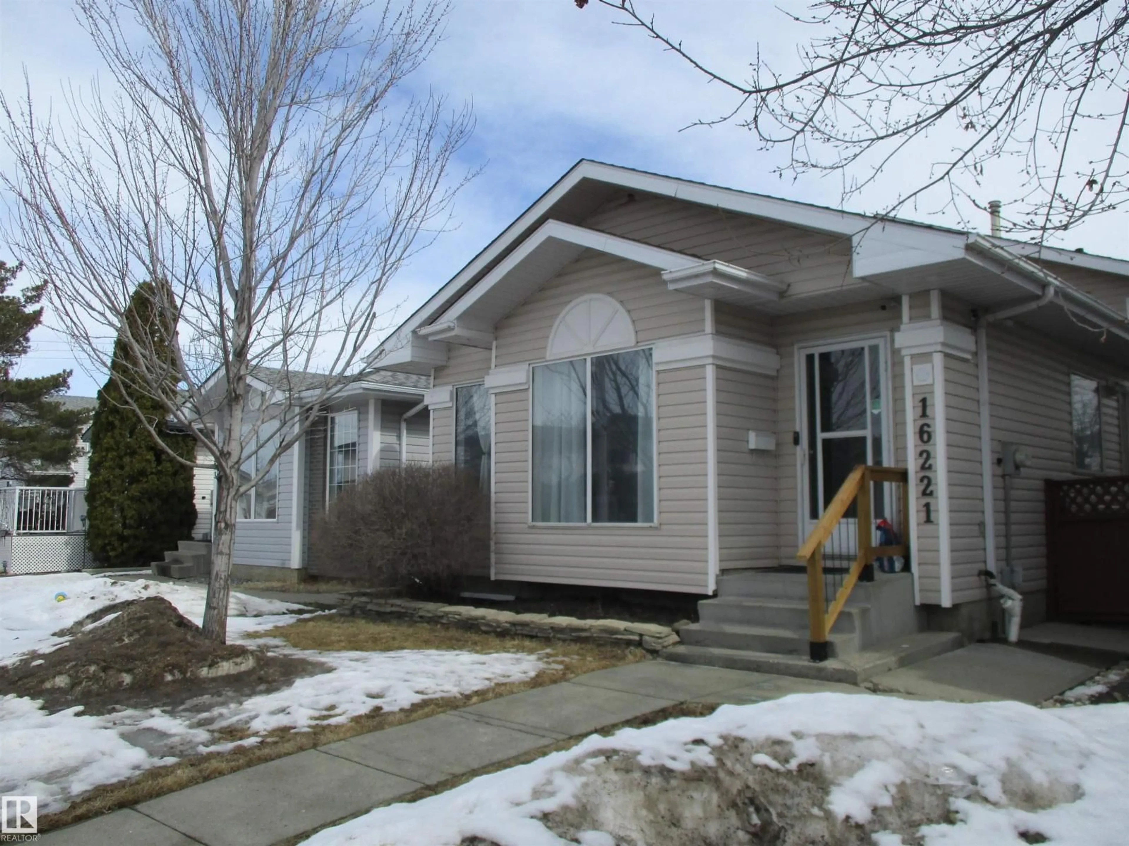 Home with vinyl exterior material, street for NW - 16221 55 A ST, Edmonton Alberta T5Y2T8
