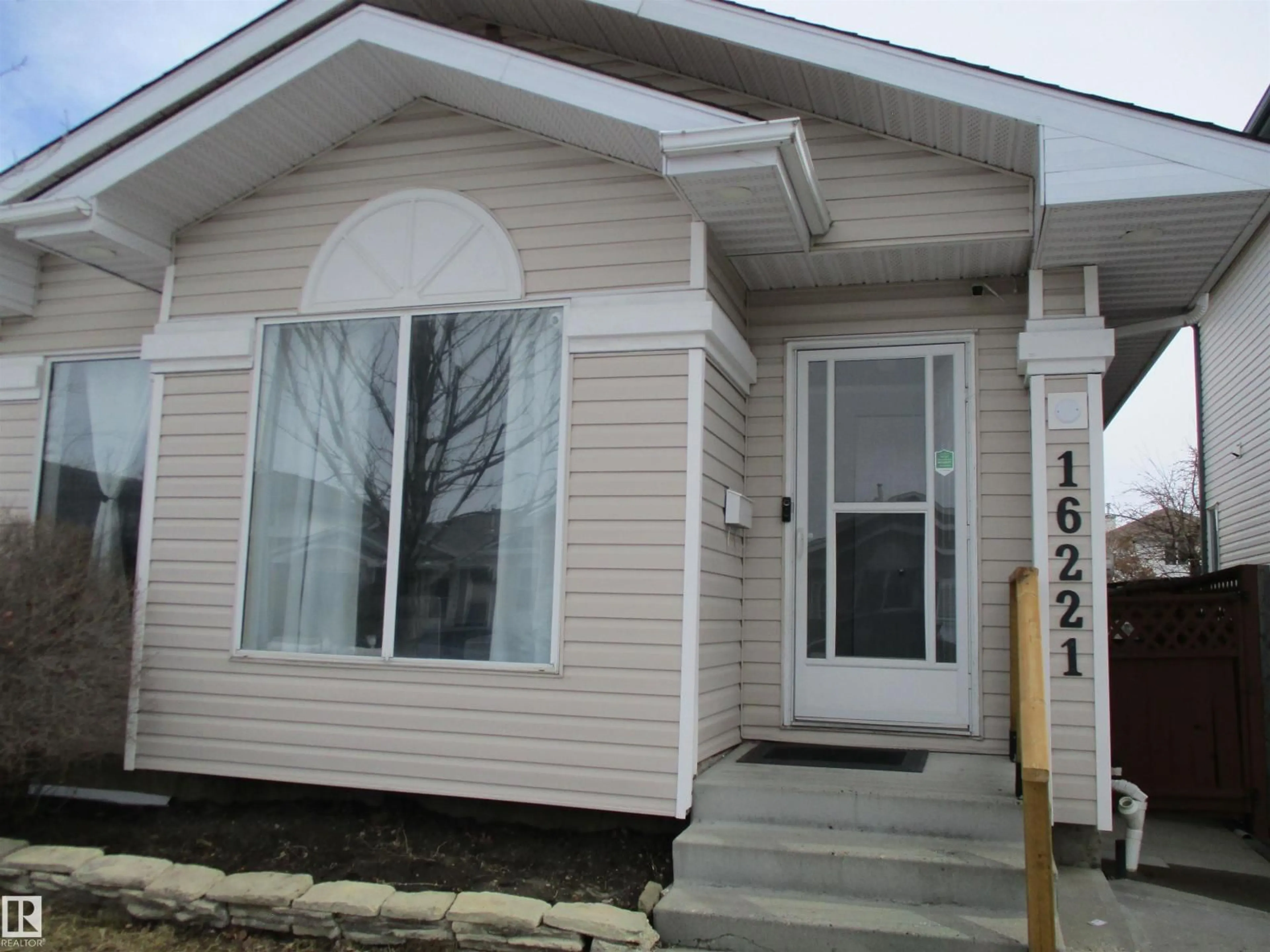 Home with vinyl exterior material, street for NW - 16221 55 A ST, Edmonton Alberta T5Y2T8