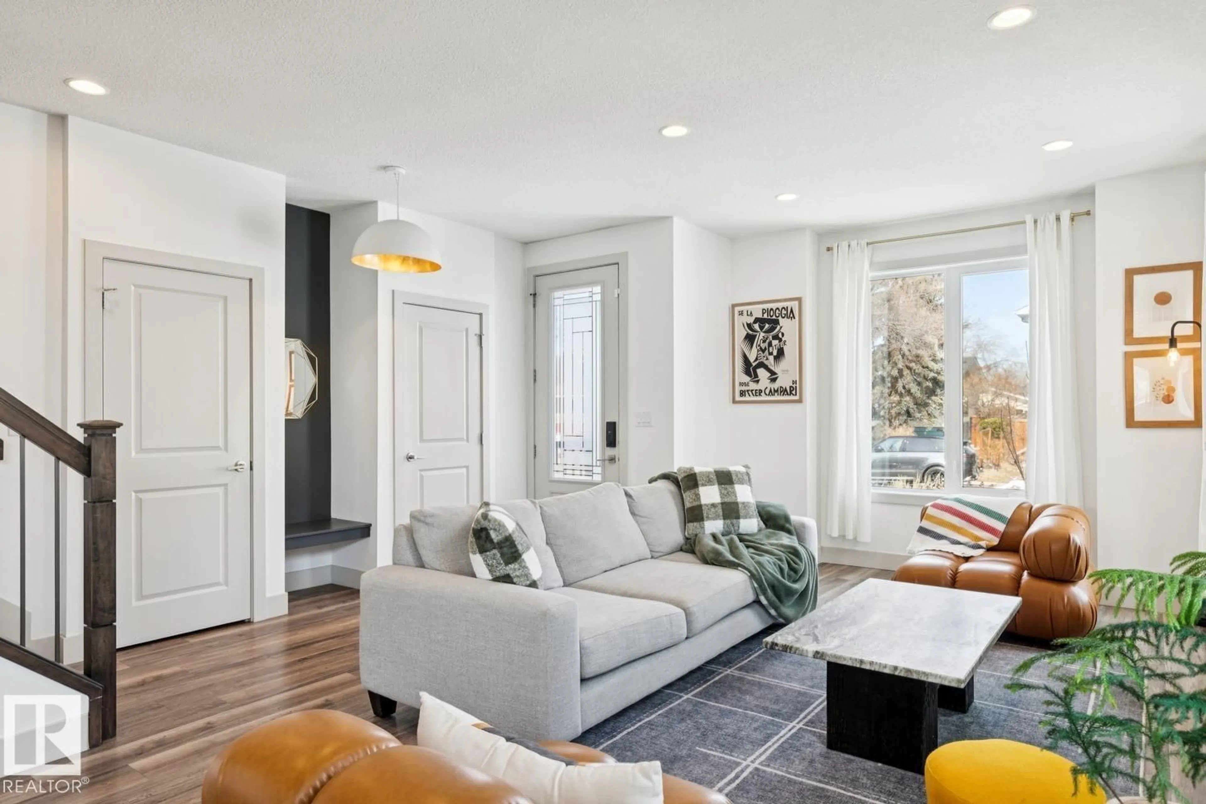 Living room with furniture, unknown for 3813 111 AV, Edmonton Alberta T5W0J9