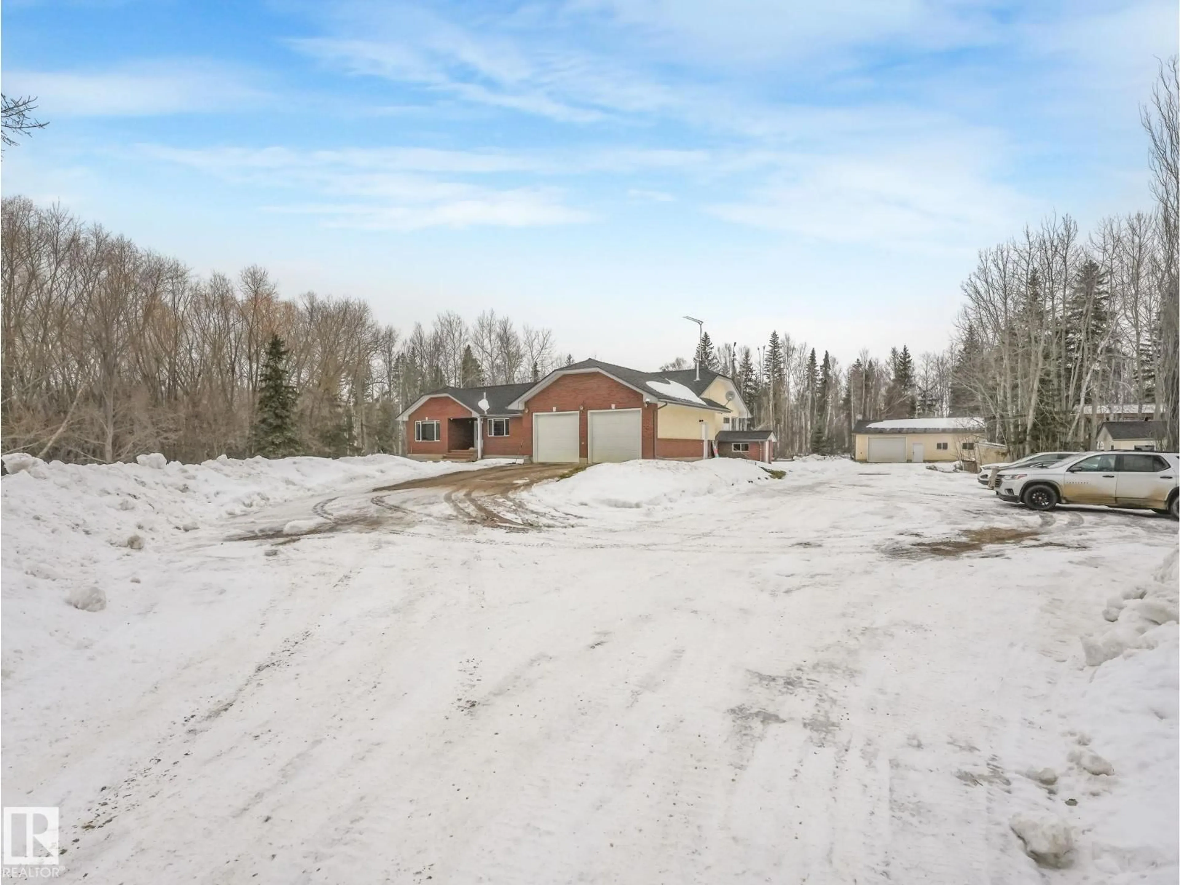 A pic from outside/outdoor area/front of a property/back of a property/a pic from drone, street for 22218 TWP 584, Rural Thorhild County Alberta T0A3J0