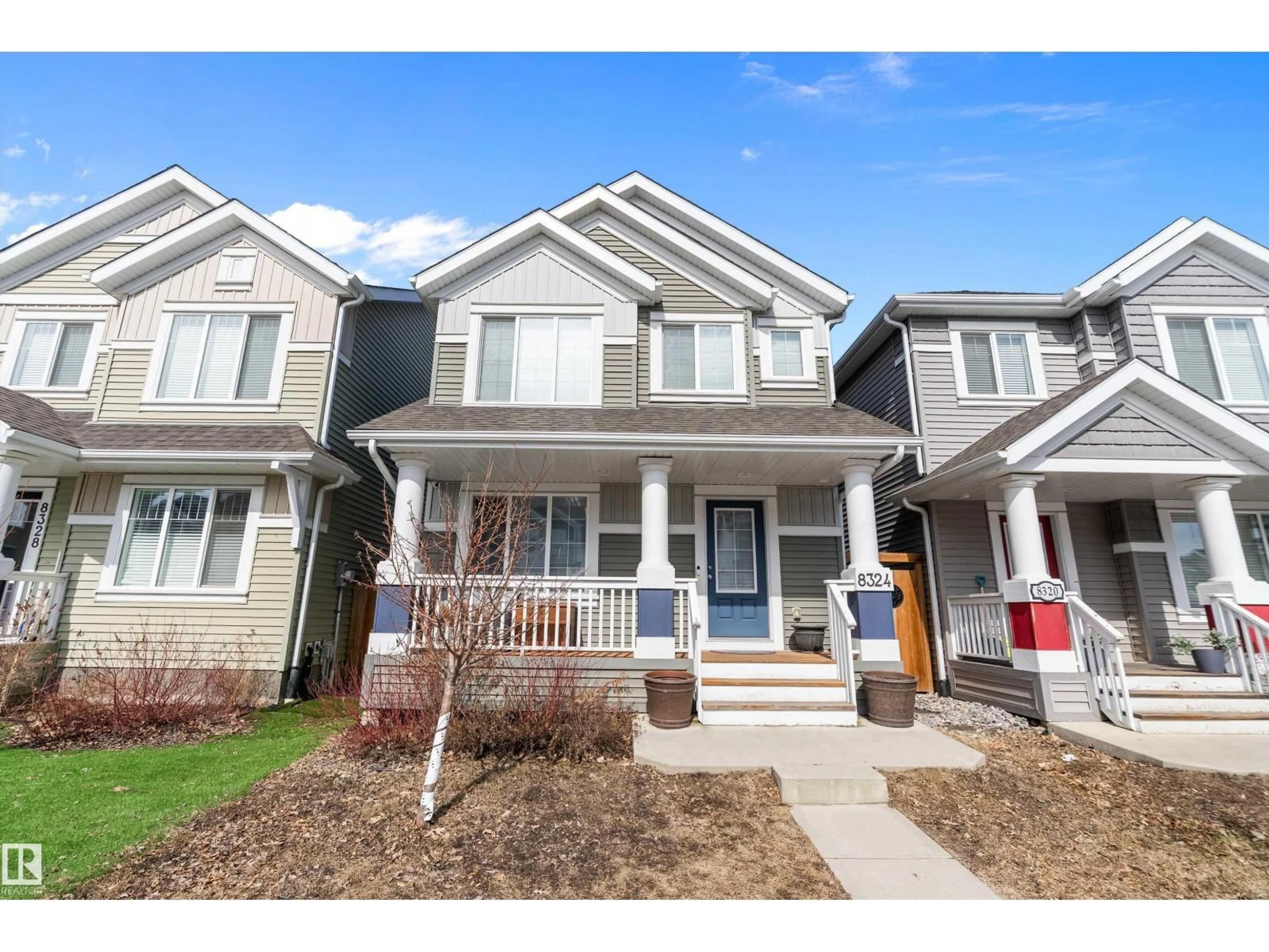 Home with vinyl exterior material, street for SW - 8324 23 AV, Edmonton Alberta T6X2G8