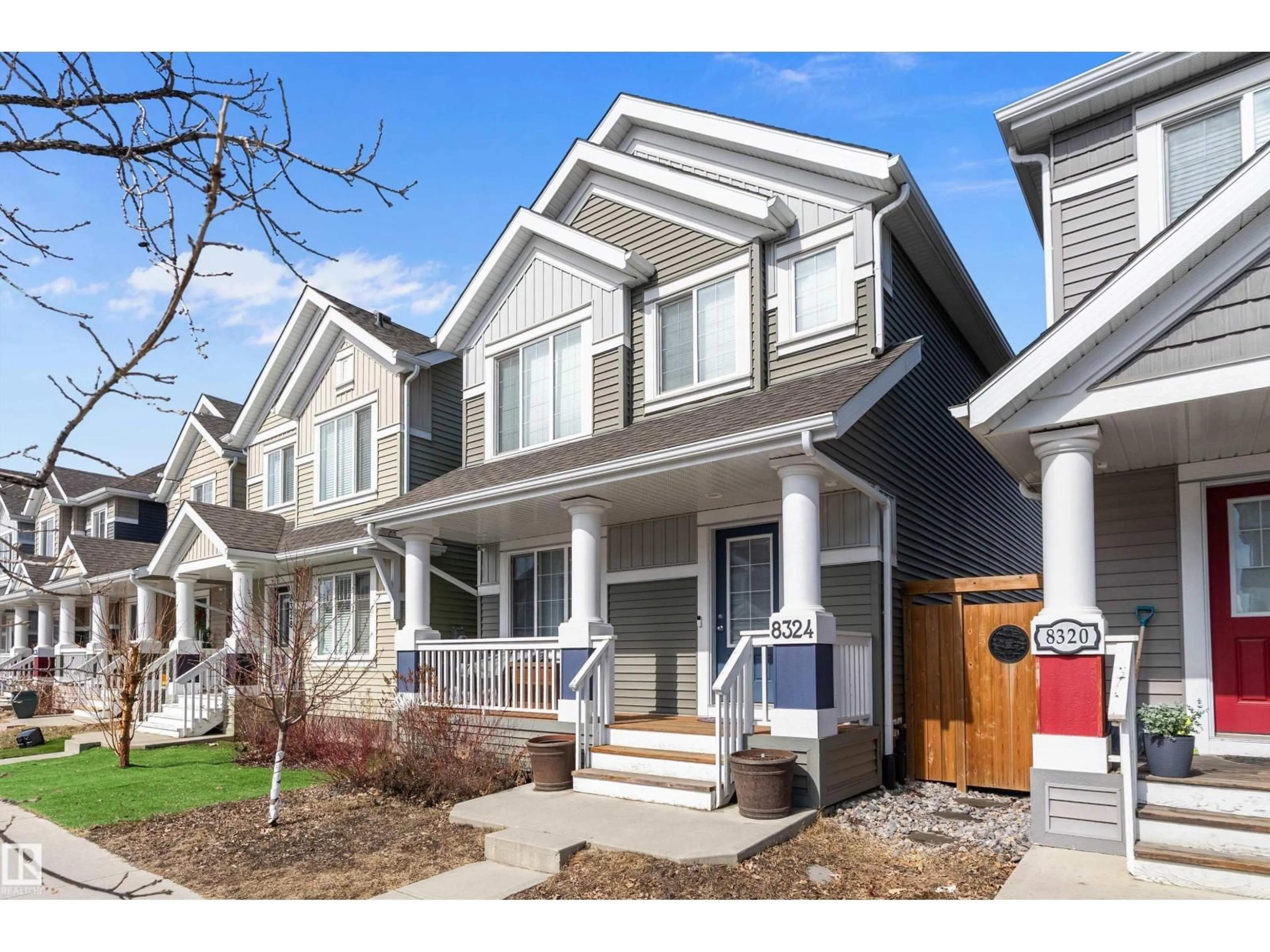 Home with vinyl exterior material, street for SW - 8324 23 AV, Edmonton Alberta T6X2G8