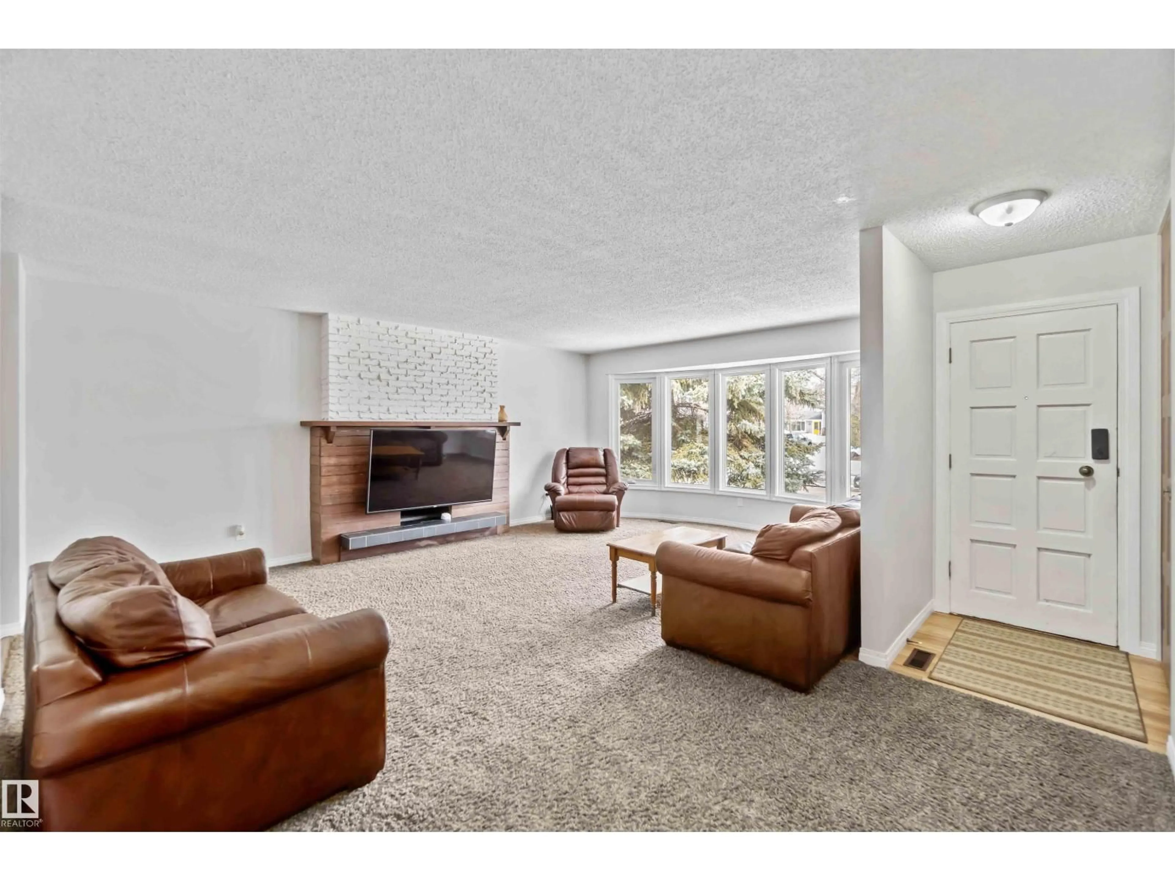 Living room with furniture, unknown for 9542 85 ST, Fort Saskatchewan Alberta T8L2T9