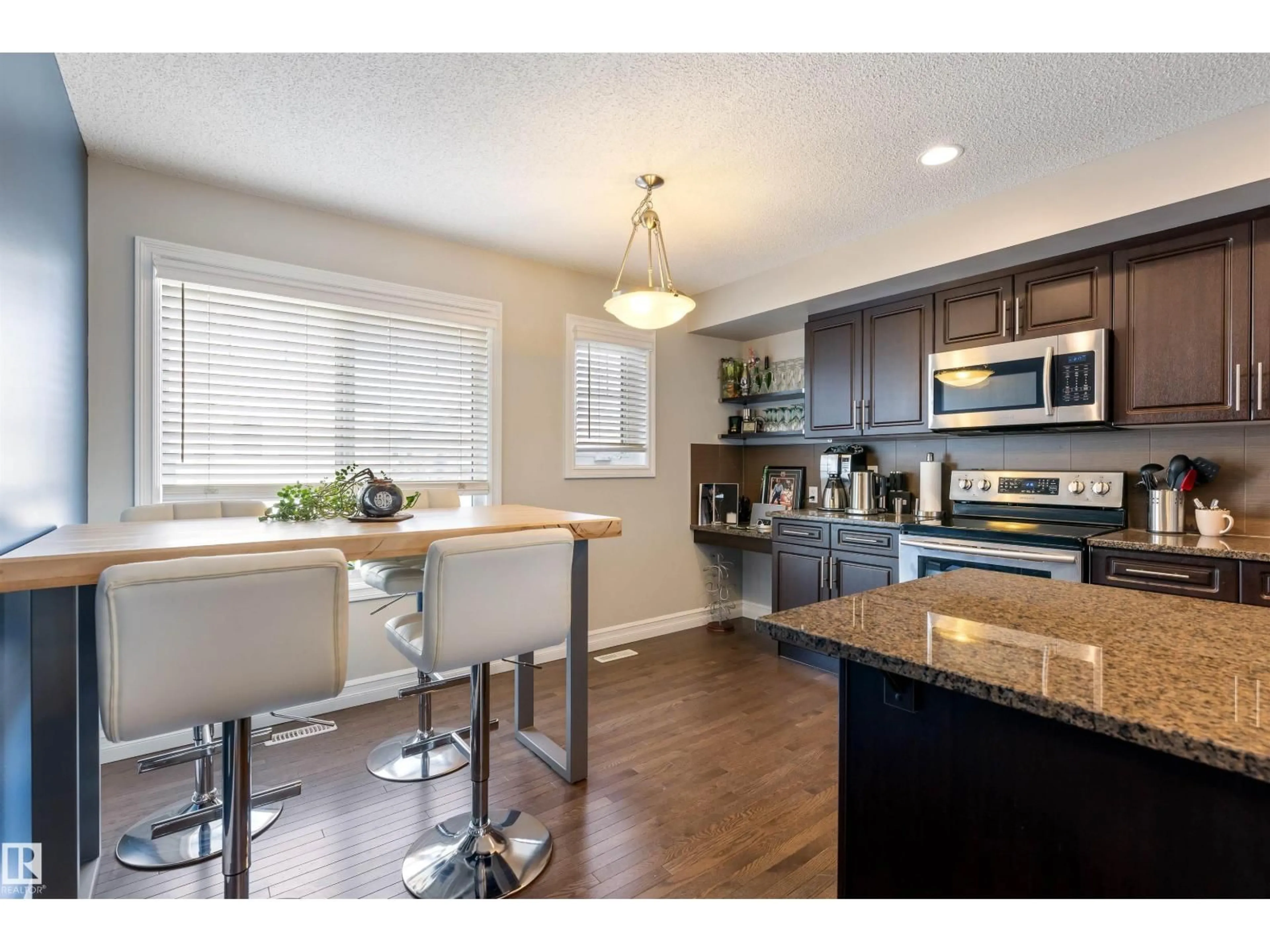 Open concept kitchen, wood/laminate floor for 655 - 64 TAMARACK RD, Edmonton Alberta T6T0N4