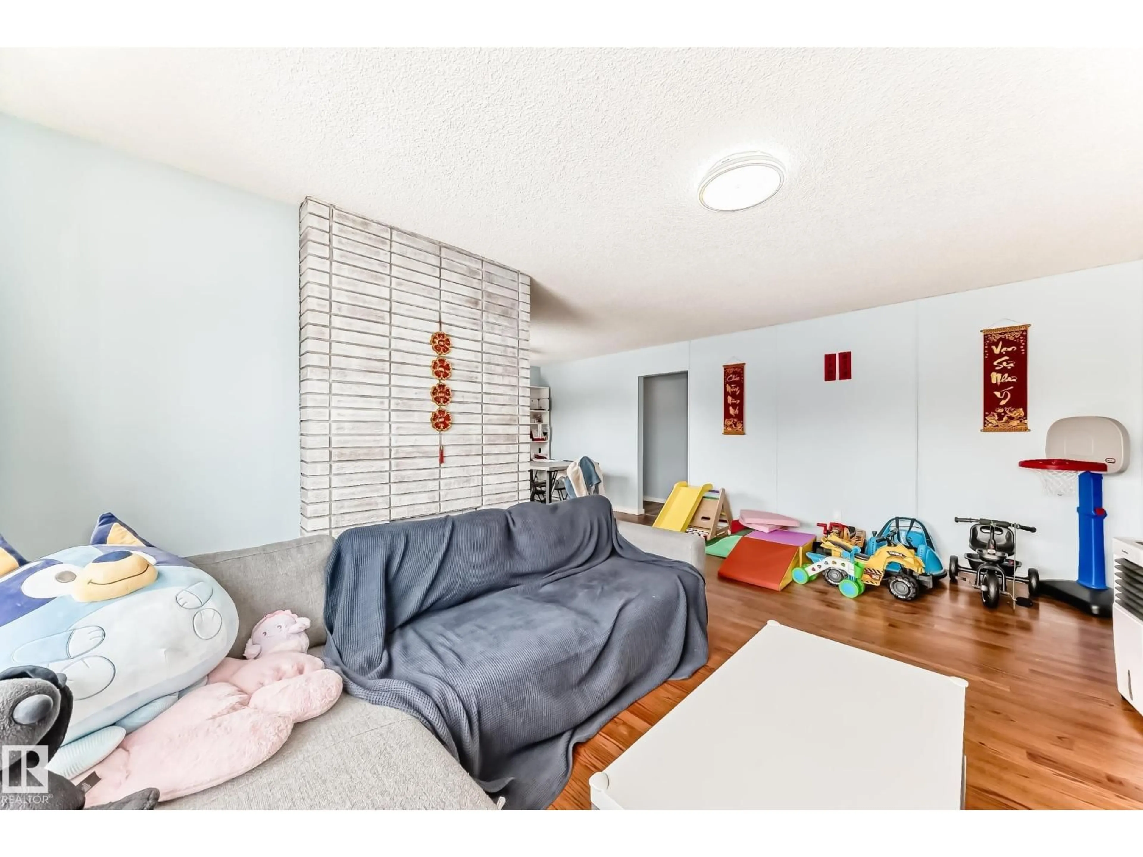 Living room with furniture, unknown for 10928 149 ST, Edmonton Alberta T5P1M6