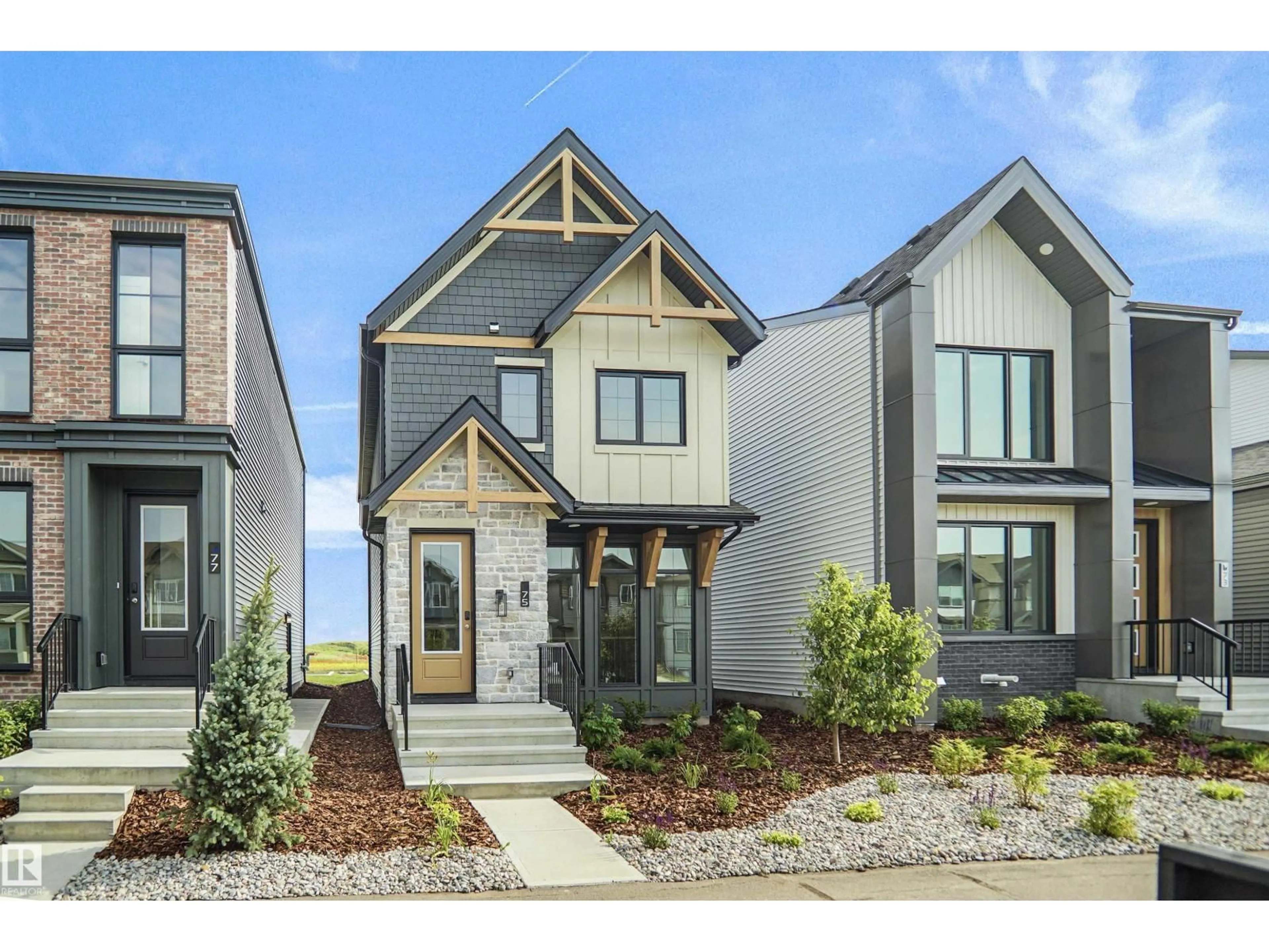 Home with brick exterior material, street for 74 JUNIPER WD, Fort Saskatchewan Alberta T8L0Z6