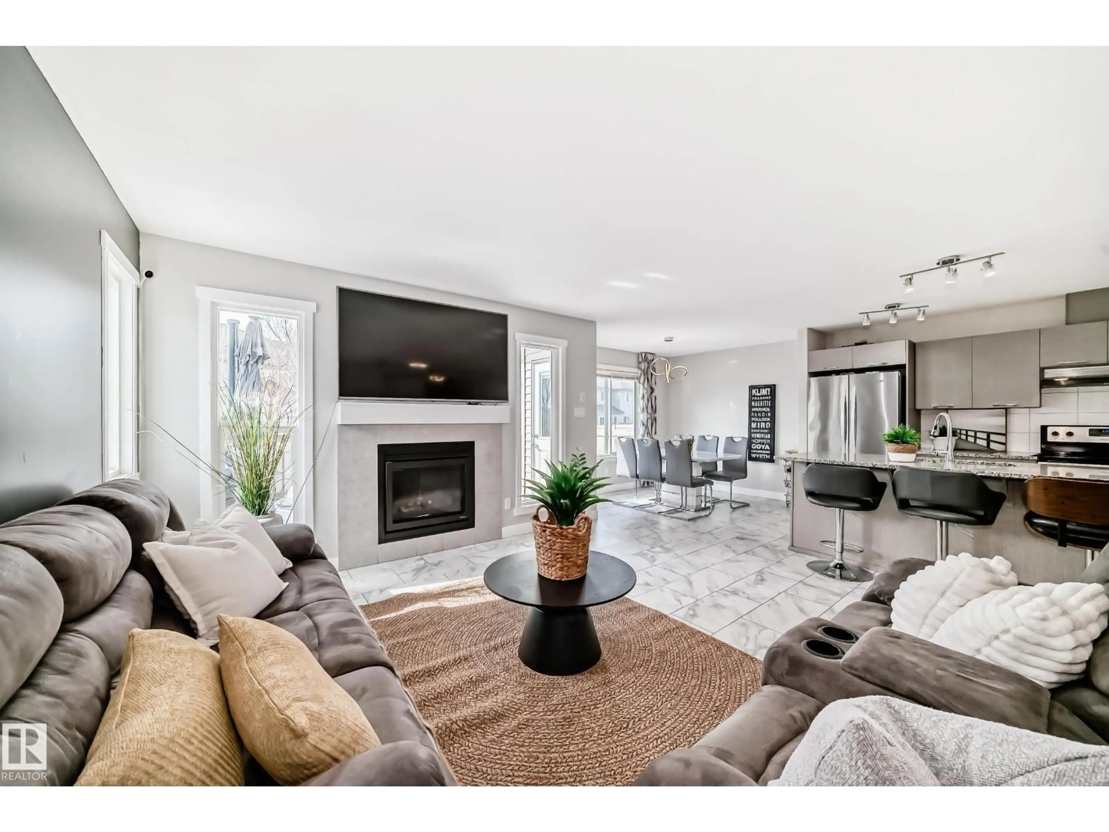 Living room with furniture, ceramic/tile floor for 4404 6 ST, Edmonton Alberta T6T0Z8