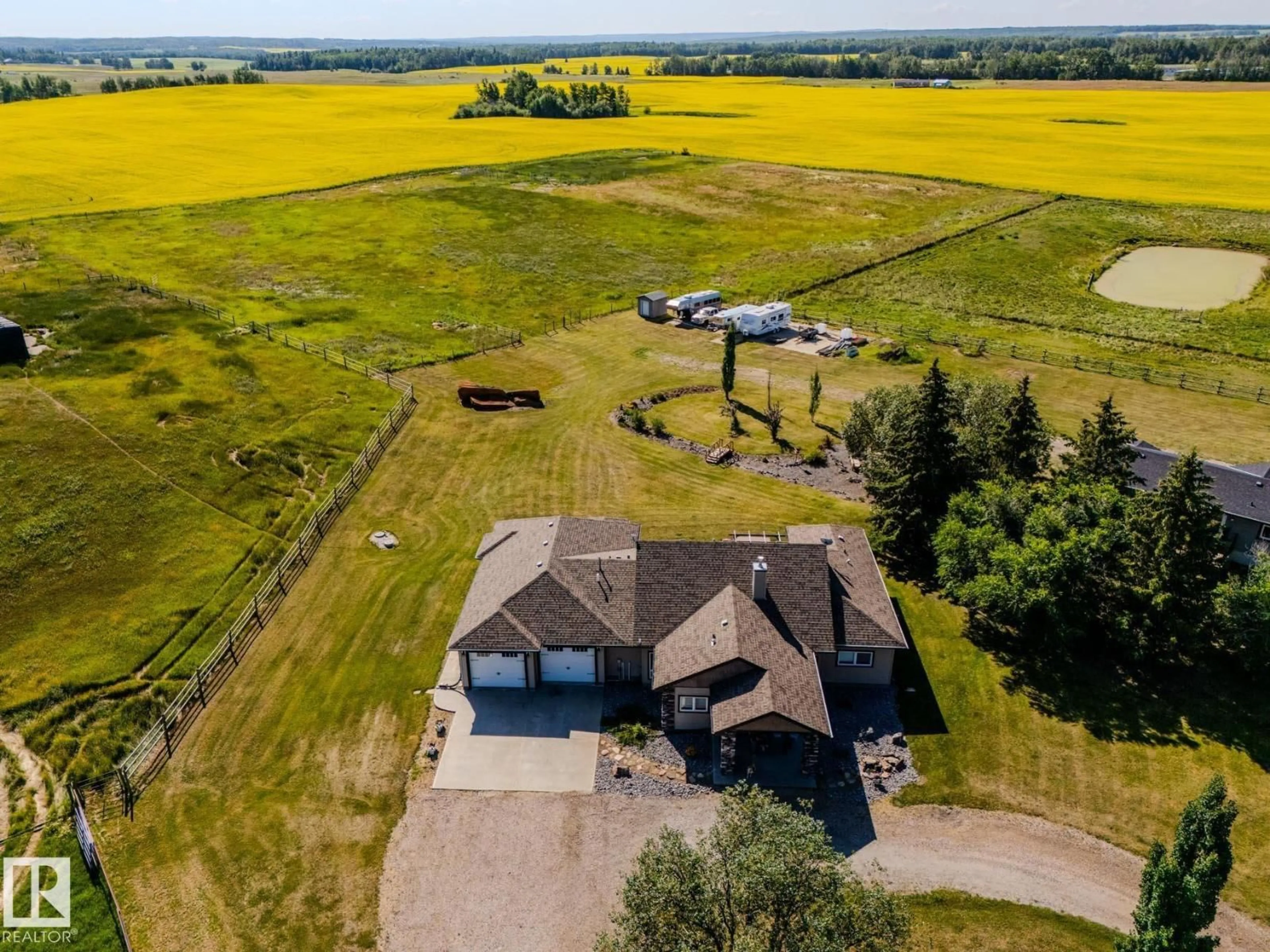 A pic from outside/outdoor area/front of a property/back of a property/a pic from drone, water/lake/river/ocean view for 55415 HIGHWAY 777, Rural Lac Ste. Anne County Alberta T0E1V0