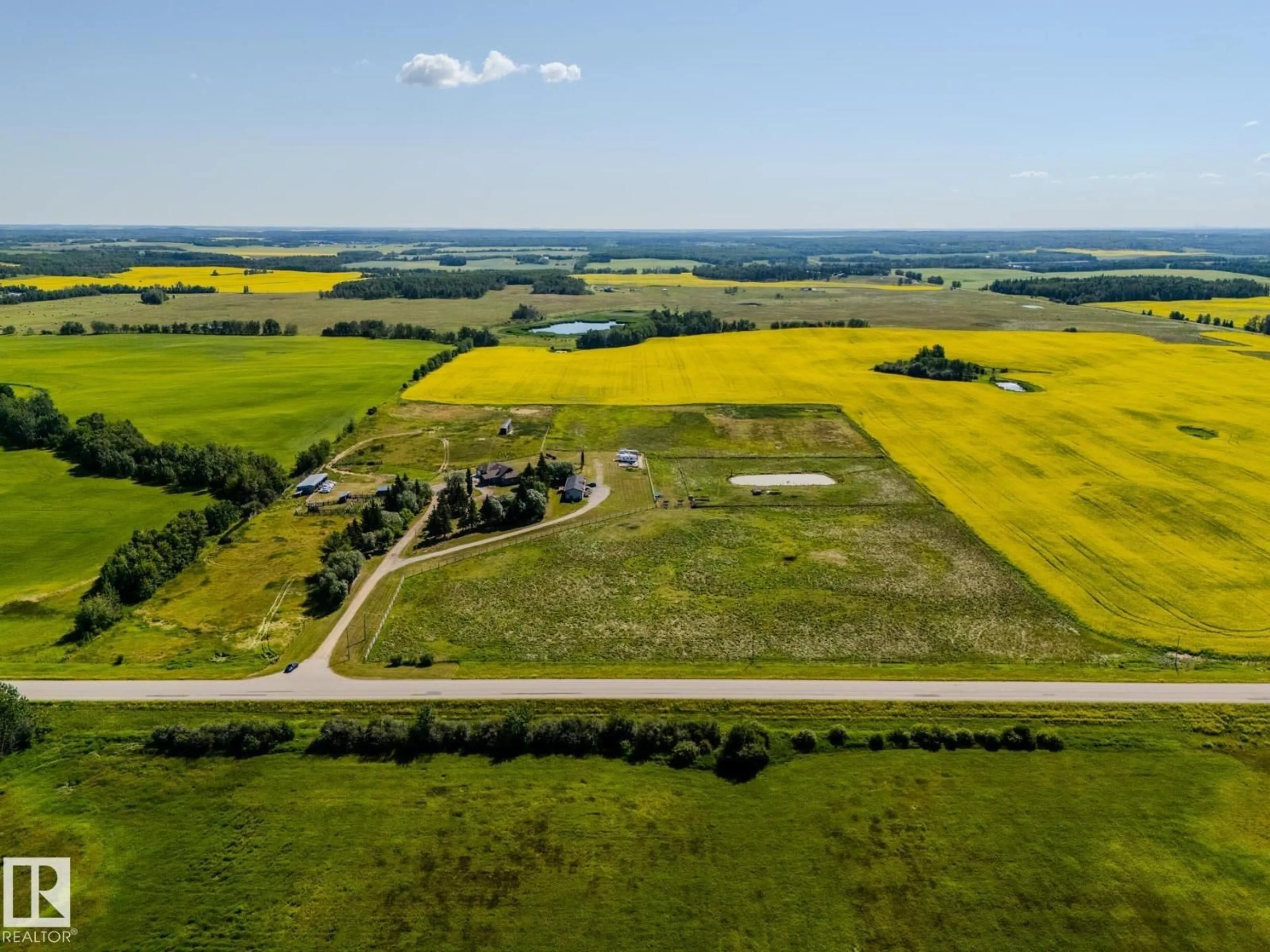A pic from outside/outdoor area/front of a property/back of a property/a pic from drone, unknown for 55415 HIGHWAY 777, Rural Lac Ste. Anne County Alberta T0E1V0