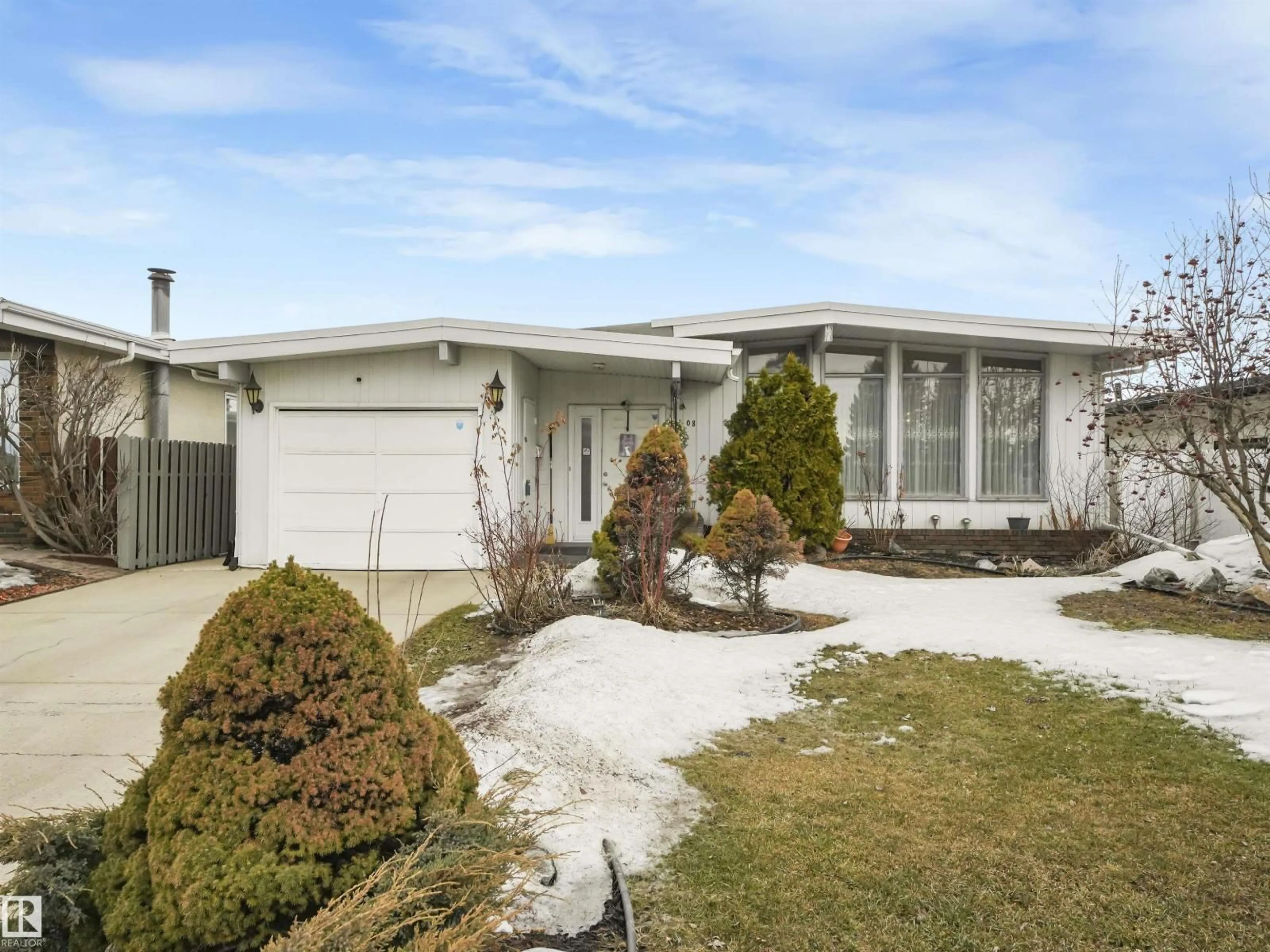 Home with vinyl exterior material, street for 8608 137AVE AV, Edmonton Alberta T5E1X9