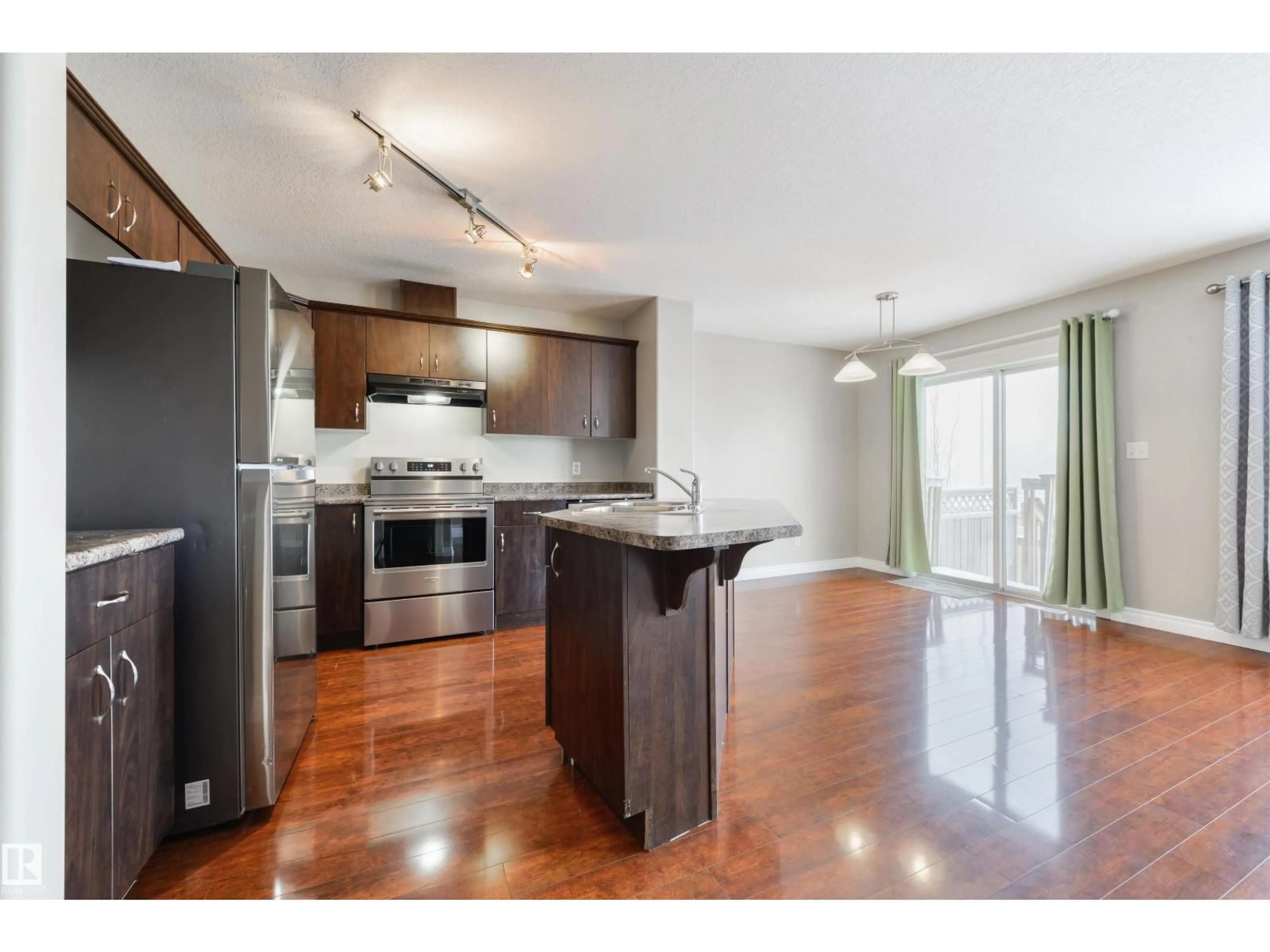 Open concept kitchen, wood/laminate floor for 68 MERIDIAN LO, Stony Plain Alberta T7Z0B9