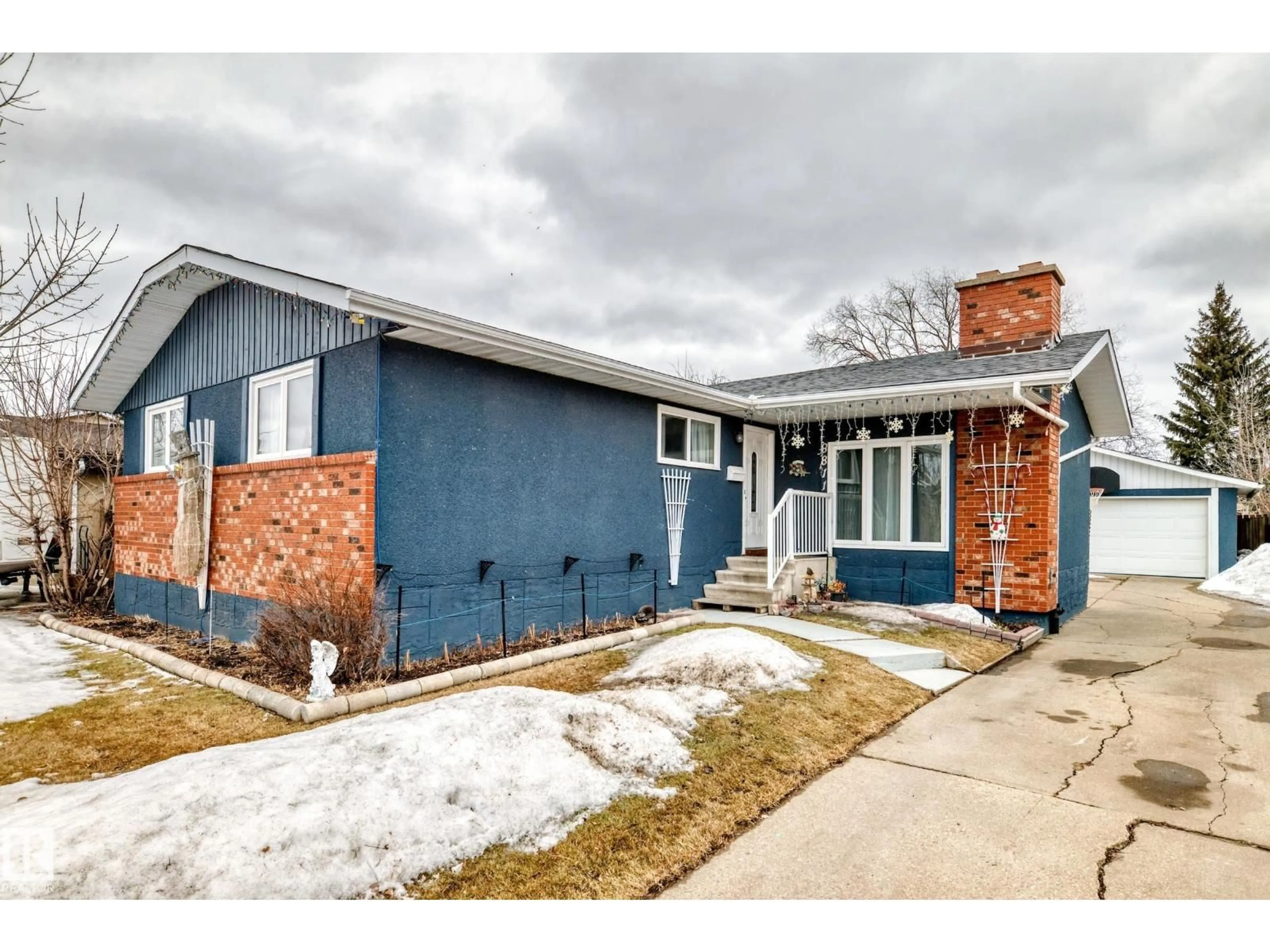 Home with brick exterior material, street for 8811 38A AV, Edmonton Alberta T6K0E7