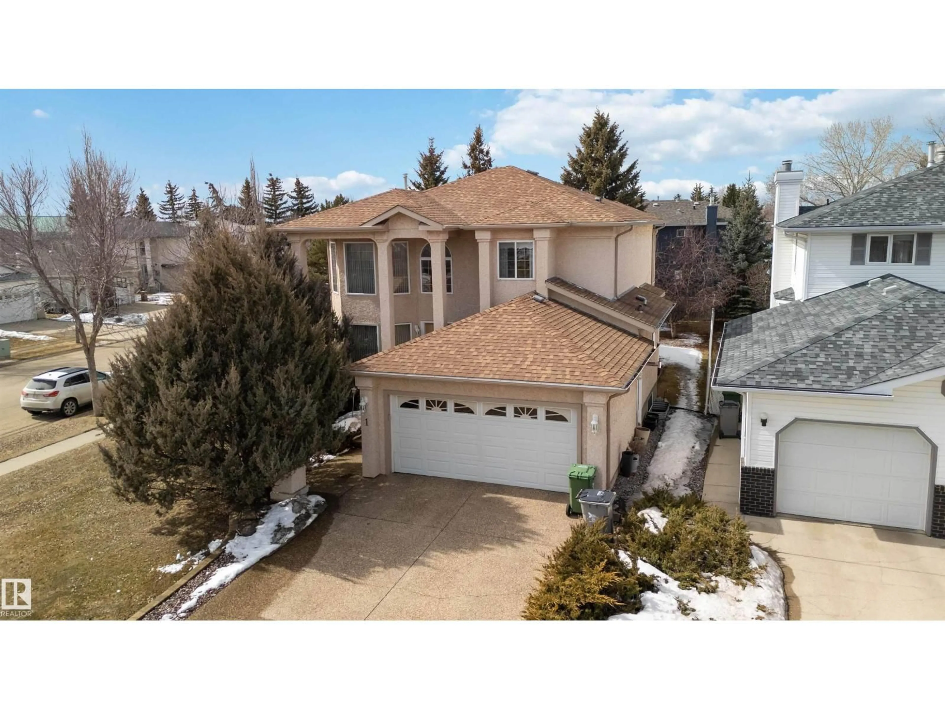 A pic from outside/outdoor area/front of a property/back of a property/a pic from drone, street for 1 COLONIAL CL, Beaumont Alberta T4X1M2