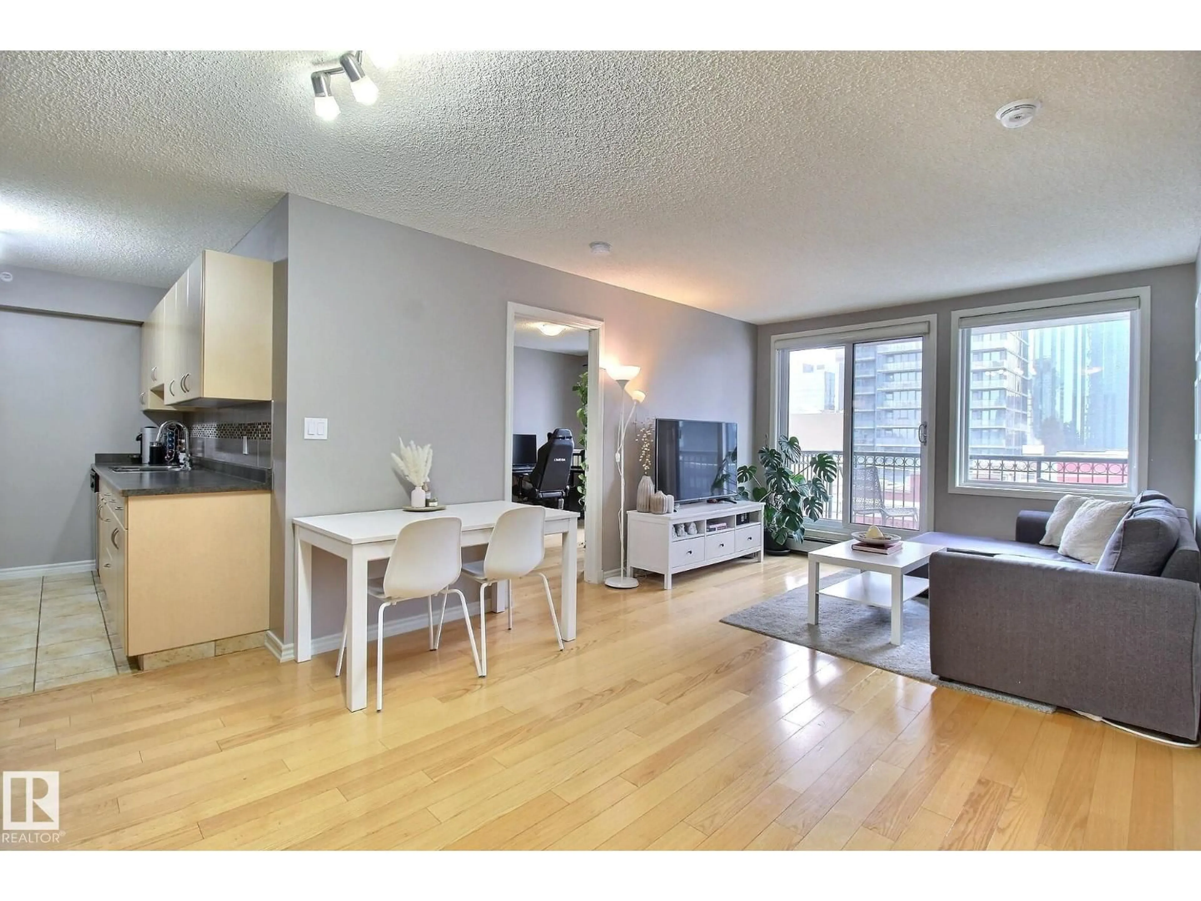Living room with furniture, wood/laminate floor for #803 - 10180 104 ST NW, Edmonton Alberta T5J1A7