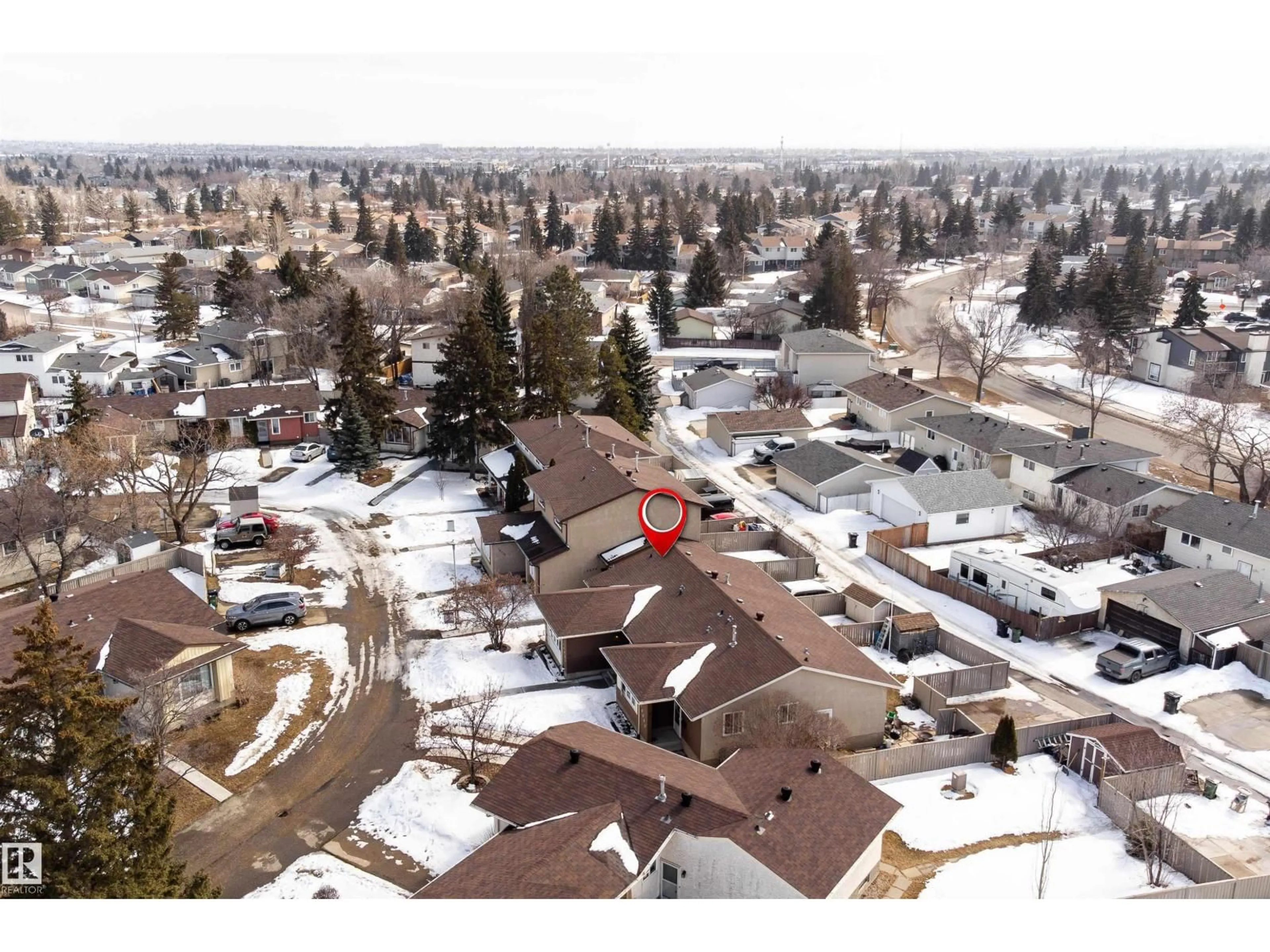 A pic from outside/outdoor area/front of a property/back of a property/a pic from drone, unknown for 10031 173 AV, Edmonton Alberta T5X3Y1