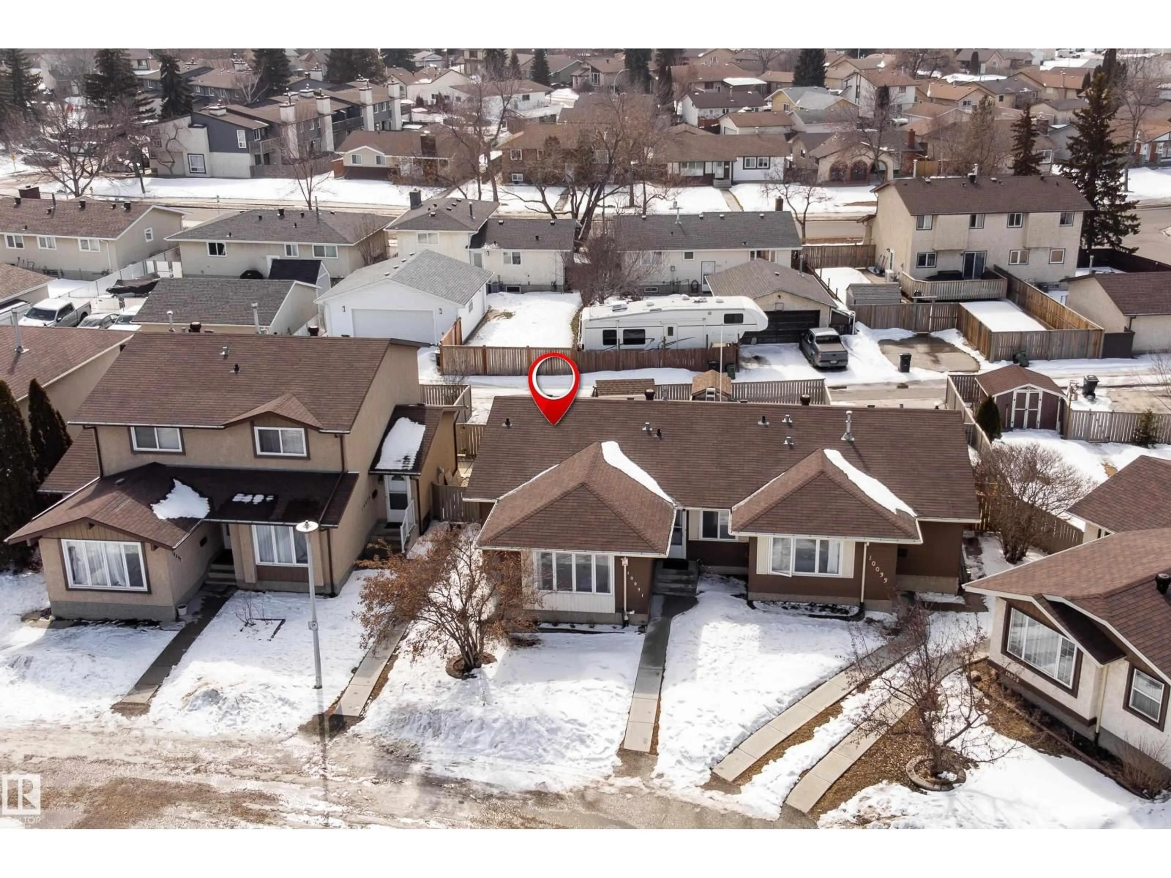 A pic from outside/outdoor area/front of a property/back of a property/a pic from drone, street for 10031 173 AV, Edmonton Alberta T5X3Y1