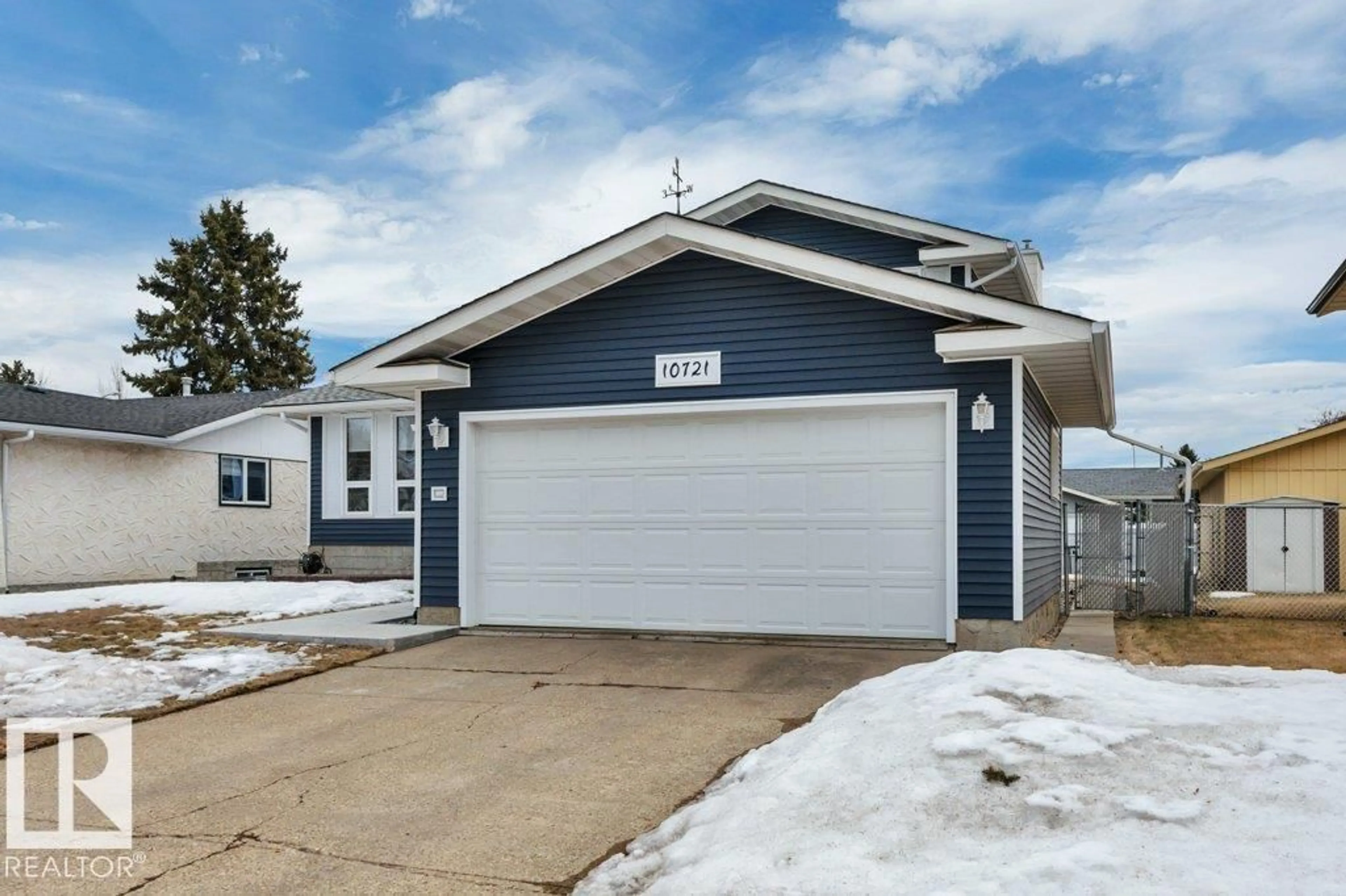 Home with vinyl exterior material, street for 10721 33A AV, Edmonton Alberta T6J2Z5