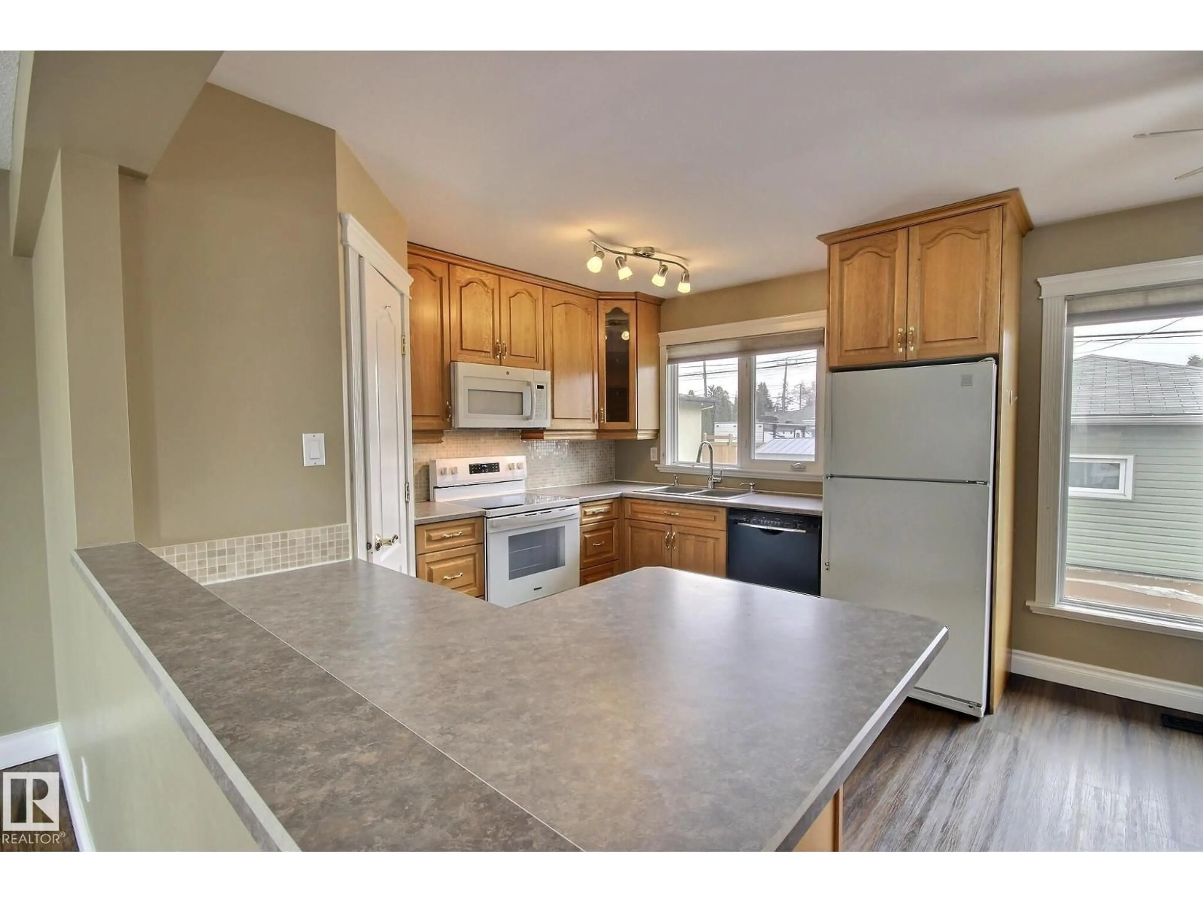 Open concept kitchen, unknown for 6003 90 AV, Edmonton Alberta T6B0P1