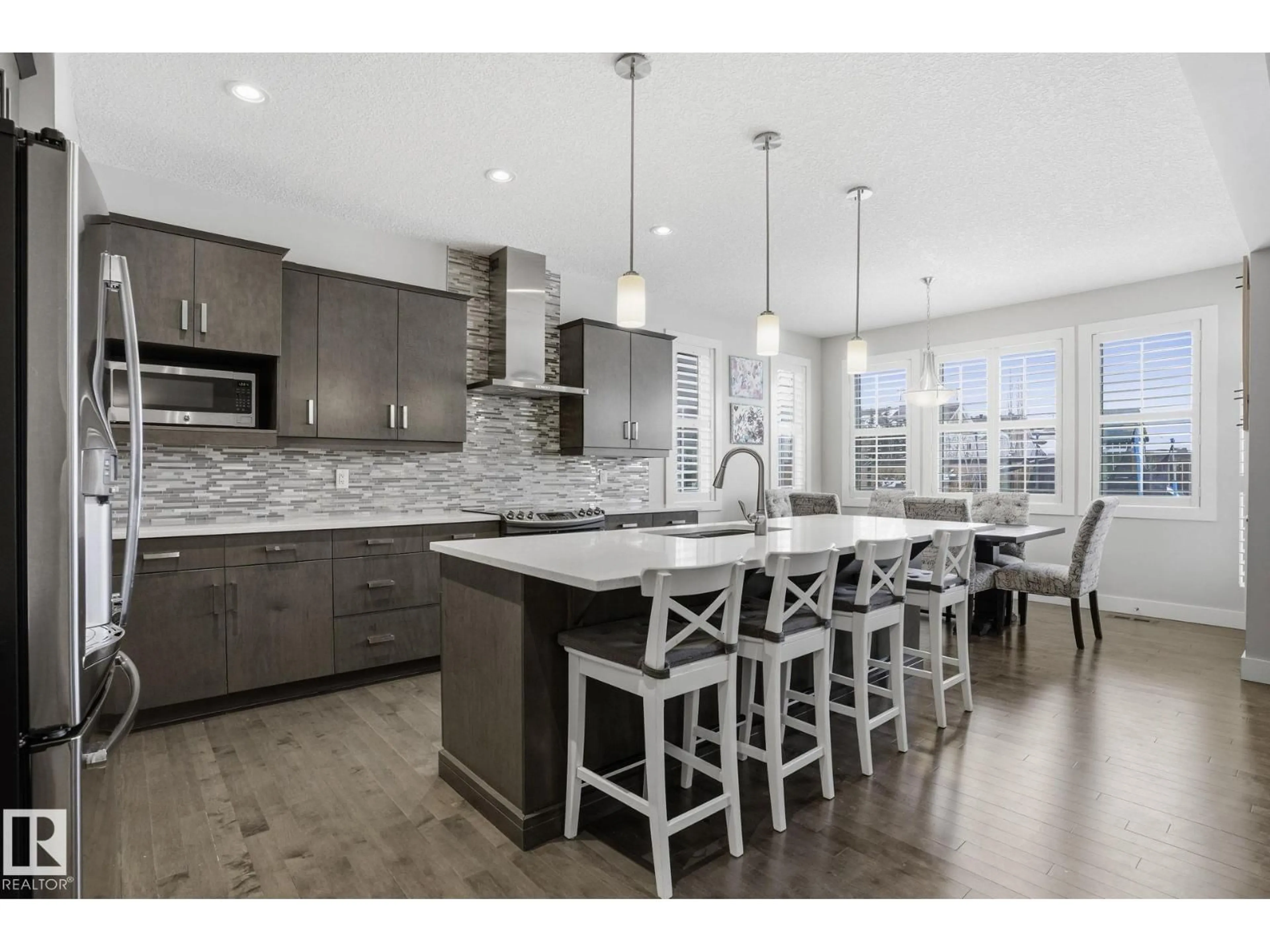 Open concept kitchen, ceramic/tile floor for SW - 1915 77 ST, Edmonton Alberta T6X1V9