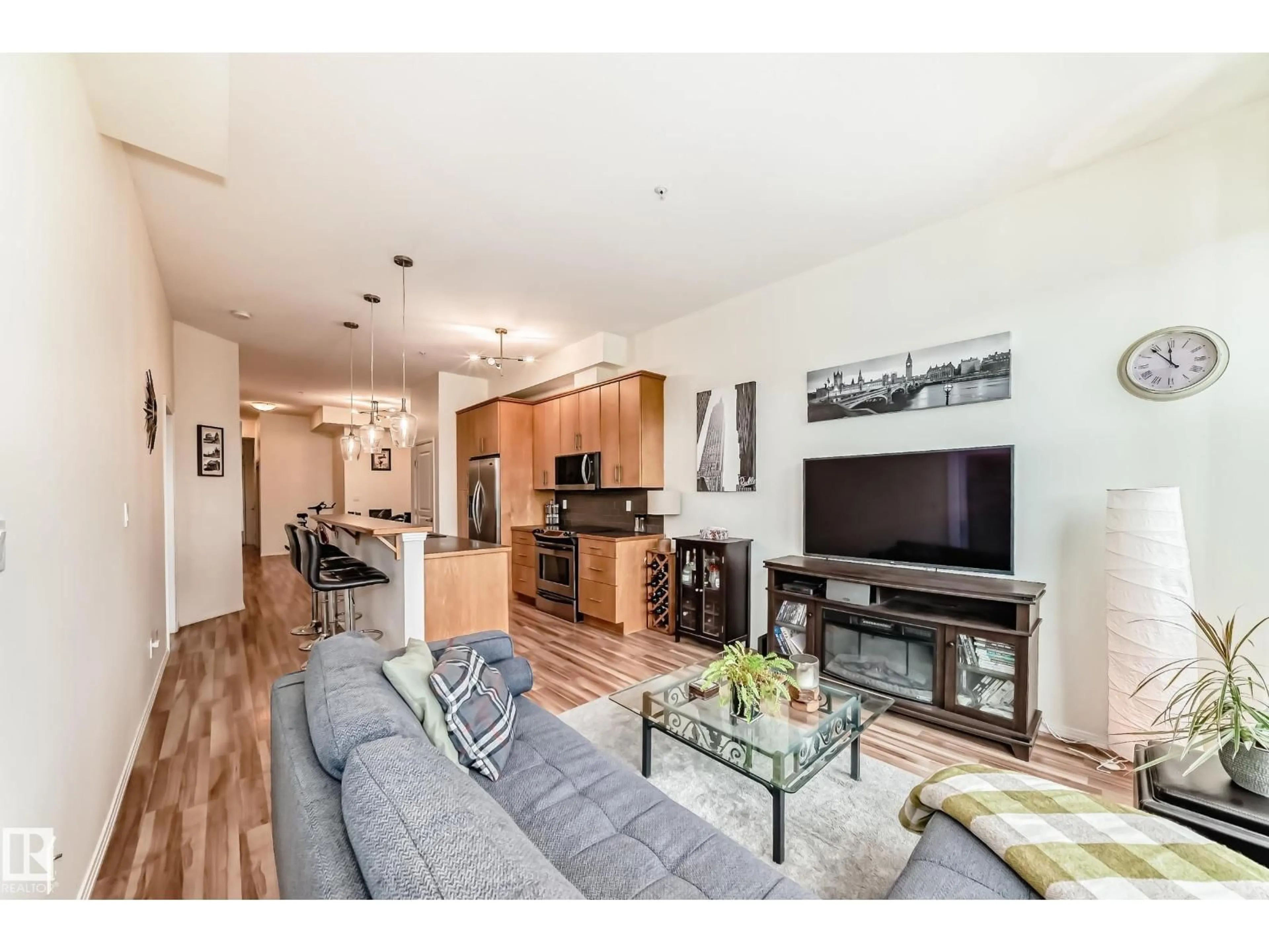 Living room with furniture, wood/laminate floor for #303 - 10531 117 ST, Edmonton Alberta T5H0A8