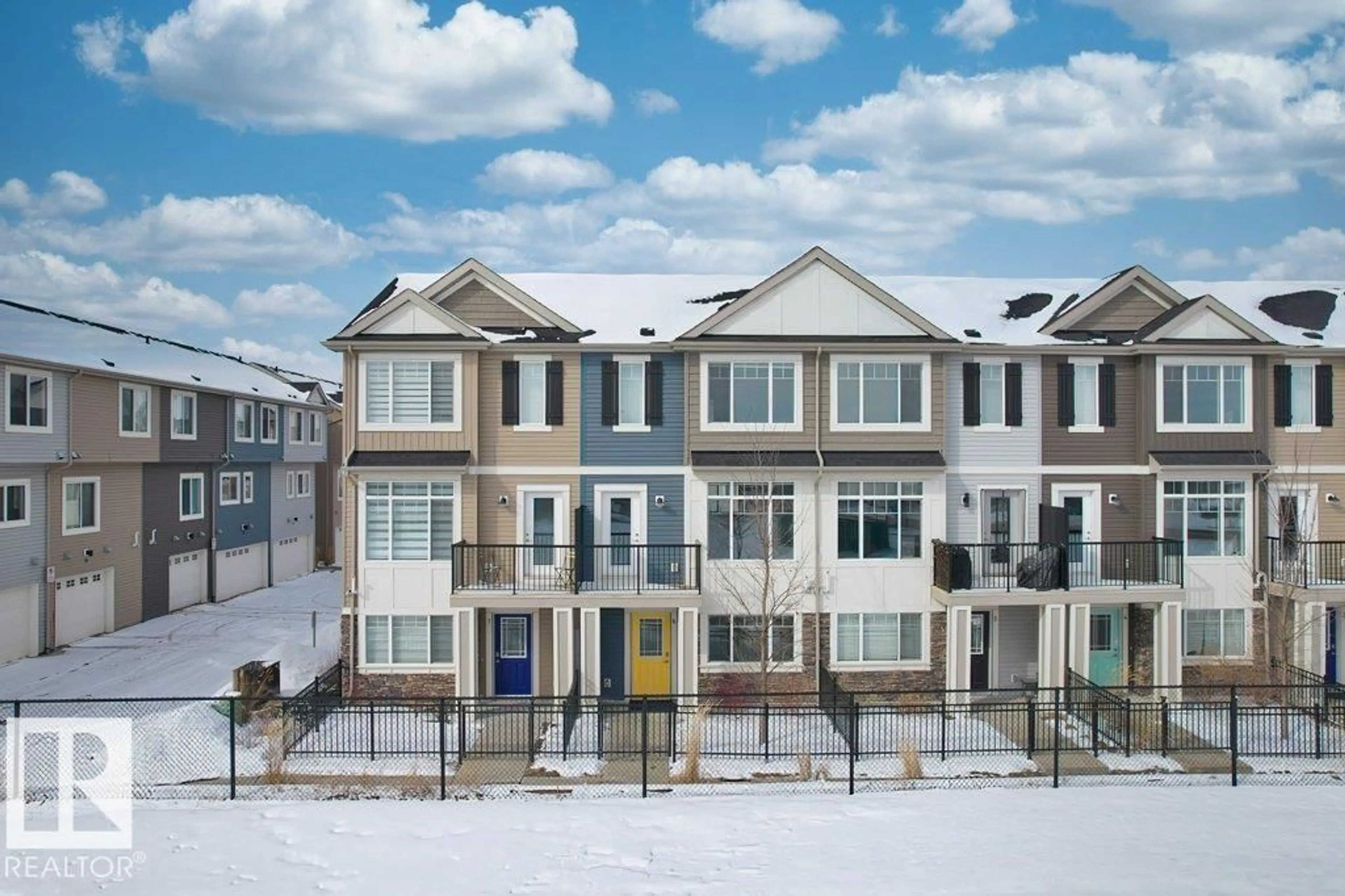 Home with vinyl exterior material, street for 6 - 11373 12 AV, Edmonton Alberta T6J5V2