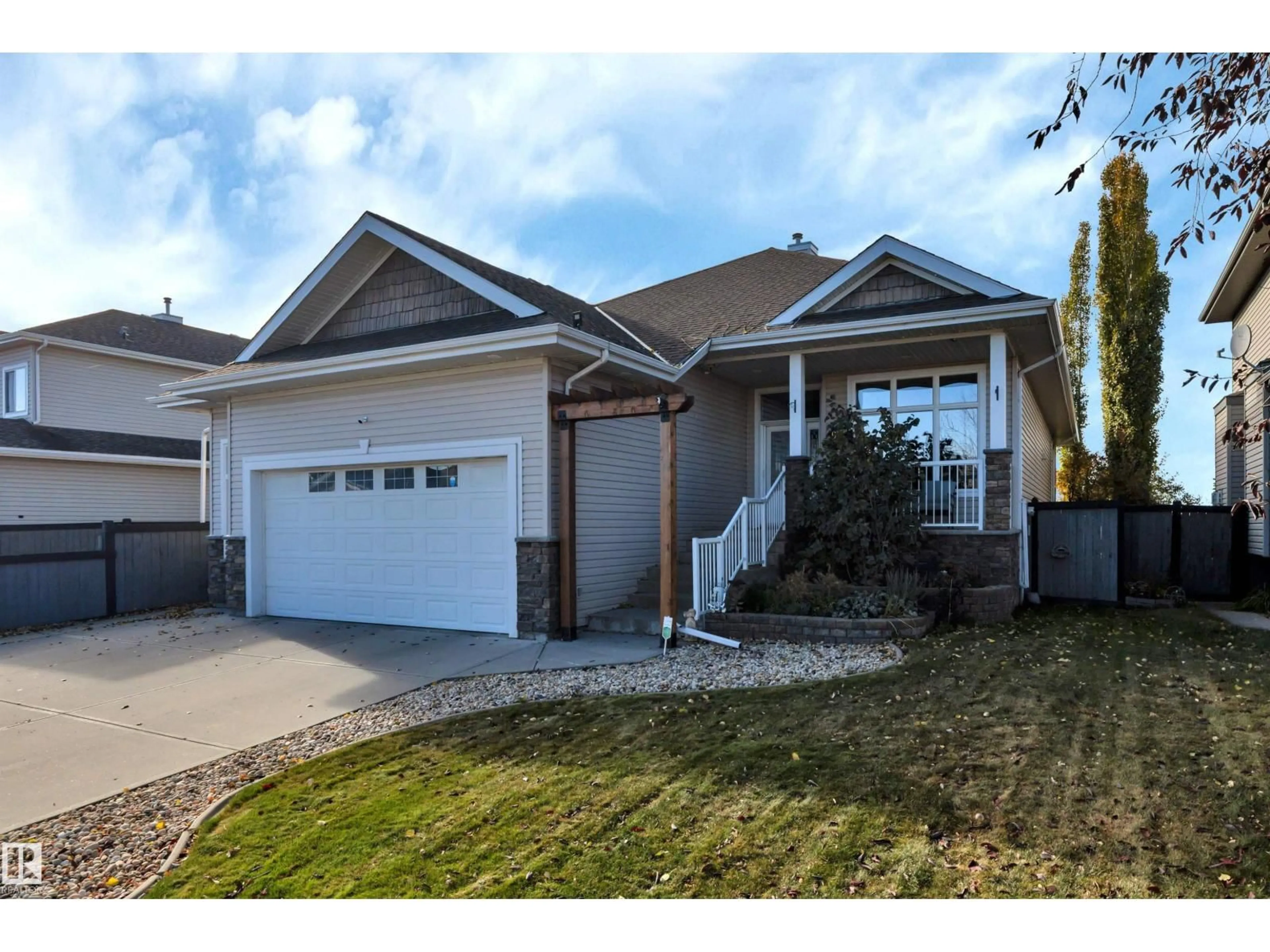 Home with vinyl exterior material, street for 99 SHORES DR, Leduc Alberta T9E8T4