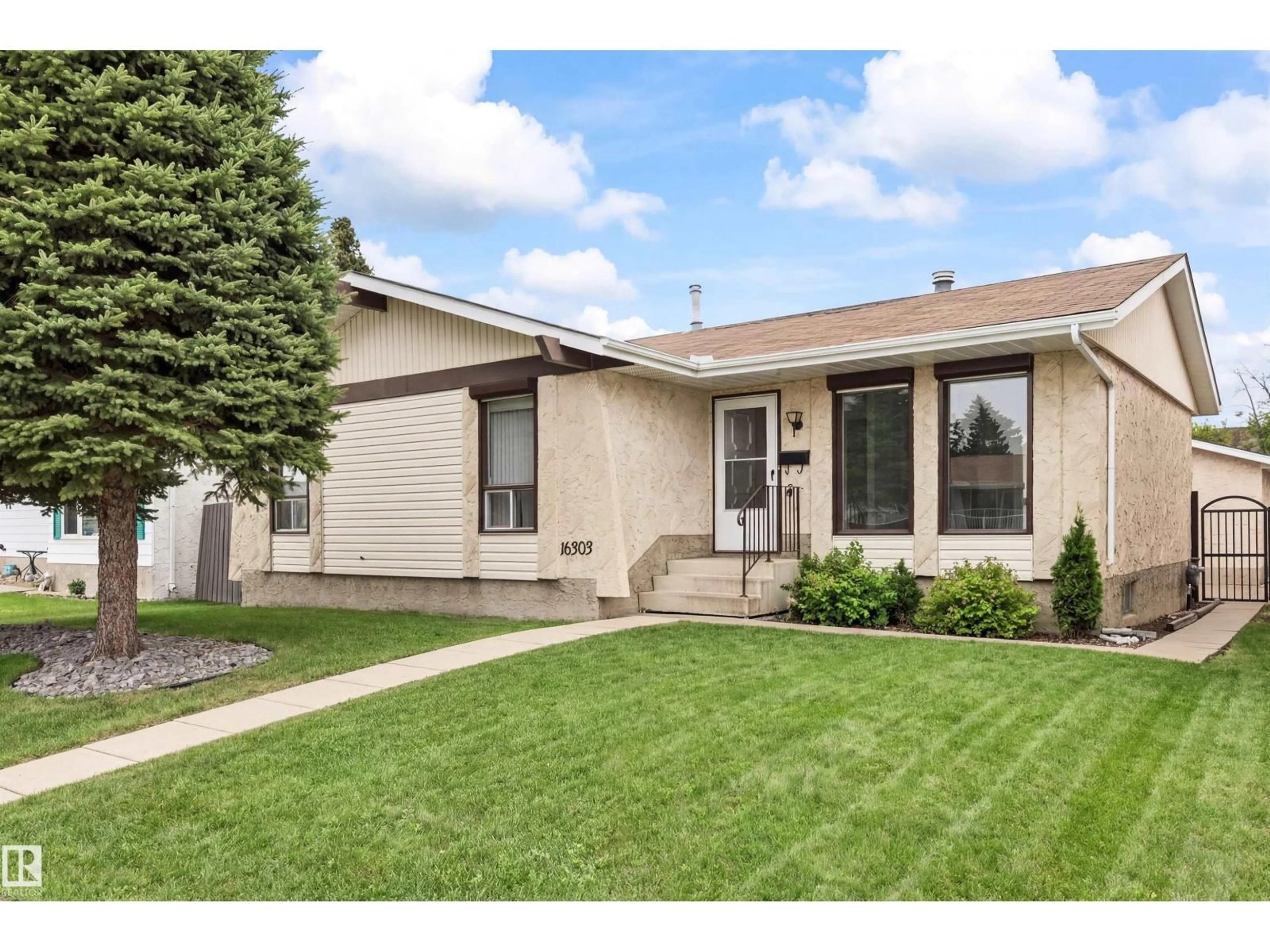 Home with vinyl exterior material, street for NW - 16303 111 ST, Edmonton Alberta T5X2A9