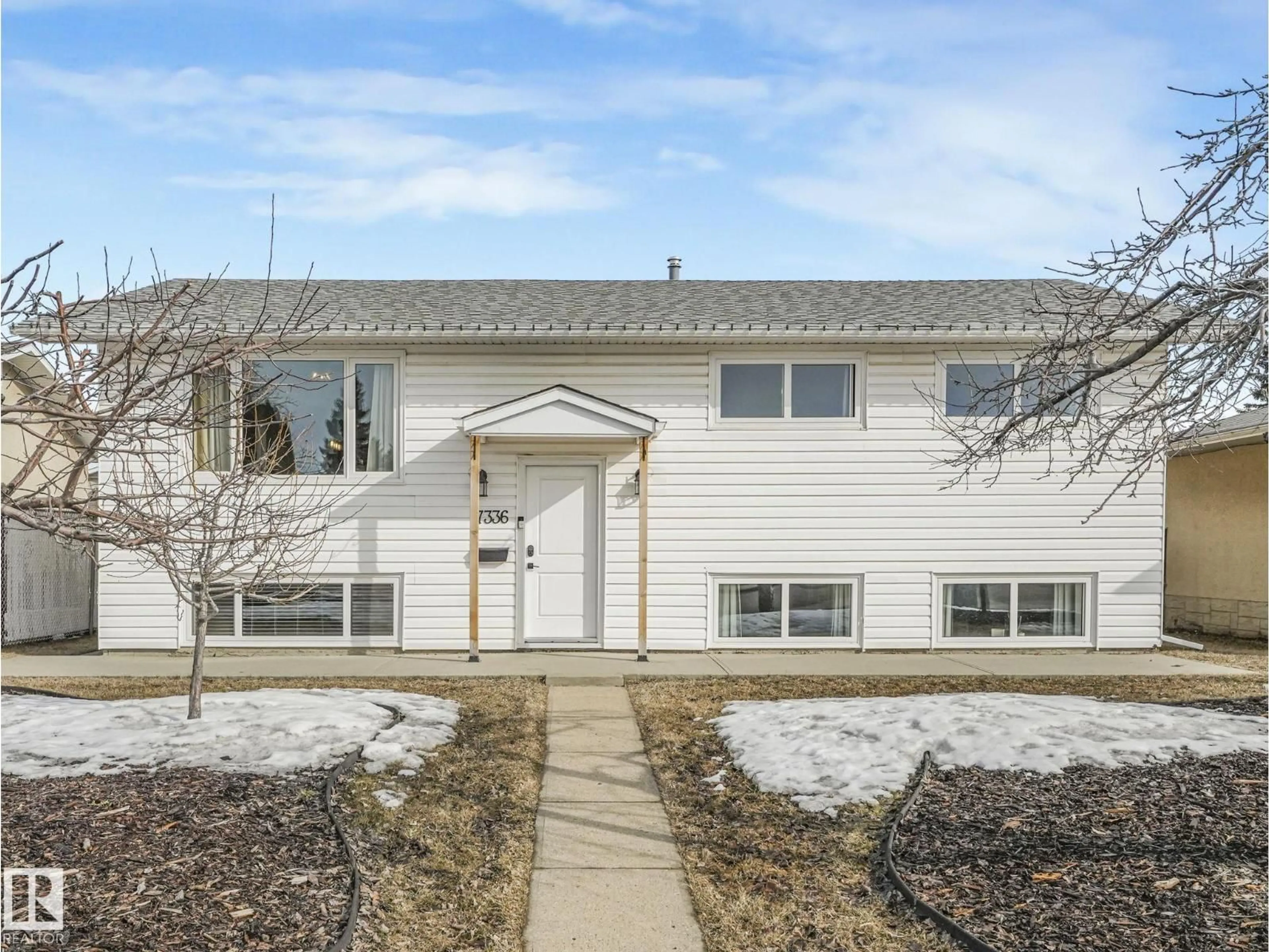 Home with vinyl exterior material, street for 7336 149A AV, Edmonton Alberta T5C2W4