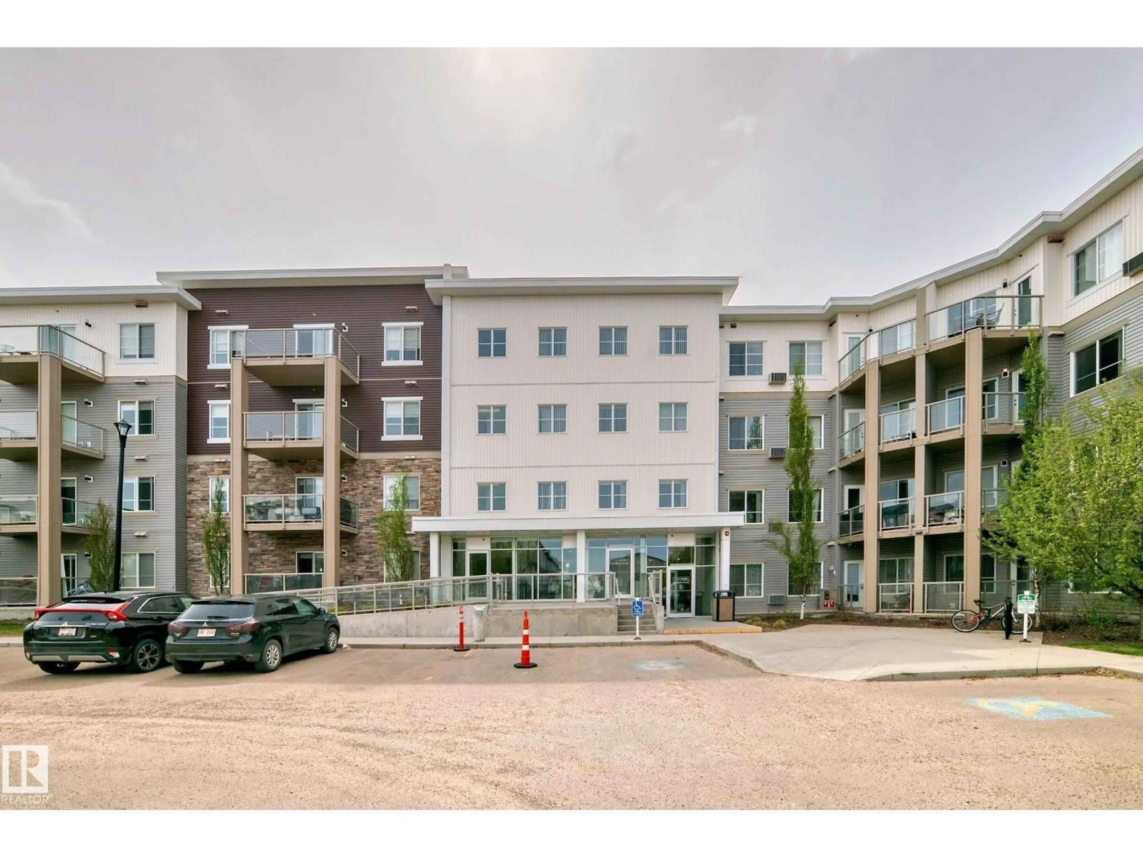 A pic from outside/outdoor area/front of a property/back of a property/a pic from drone, unknown for #208 - 812 WELSH DR, Edmonton Alberta T6X1Y7