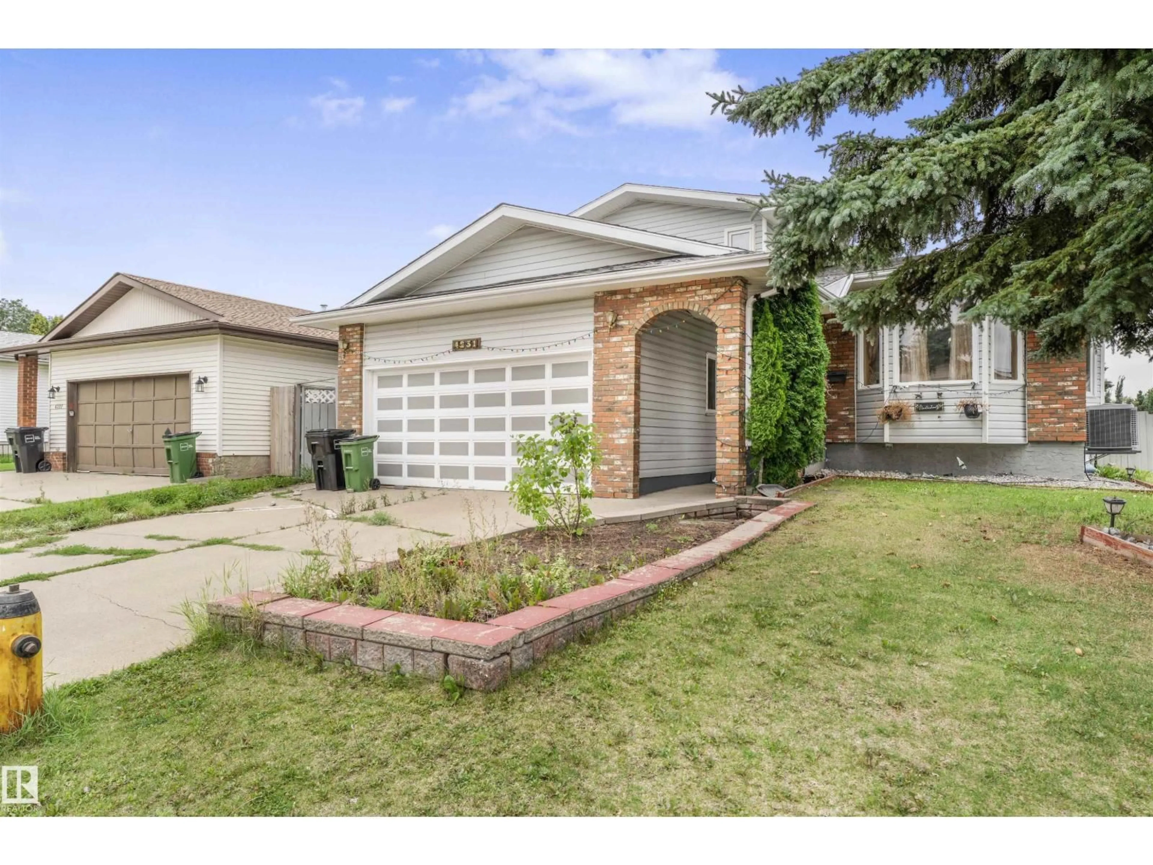 Home with brick exterior material, street for 4231 32 AV, Edmonton Alberta T6L3W5