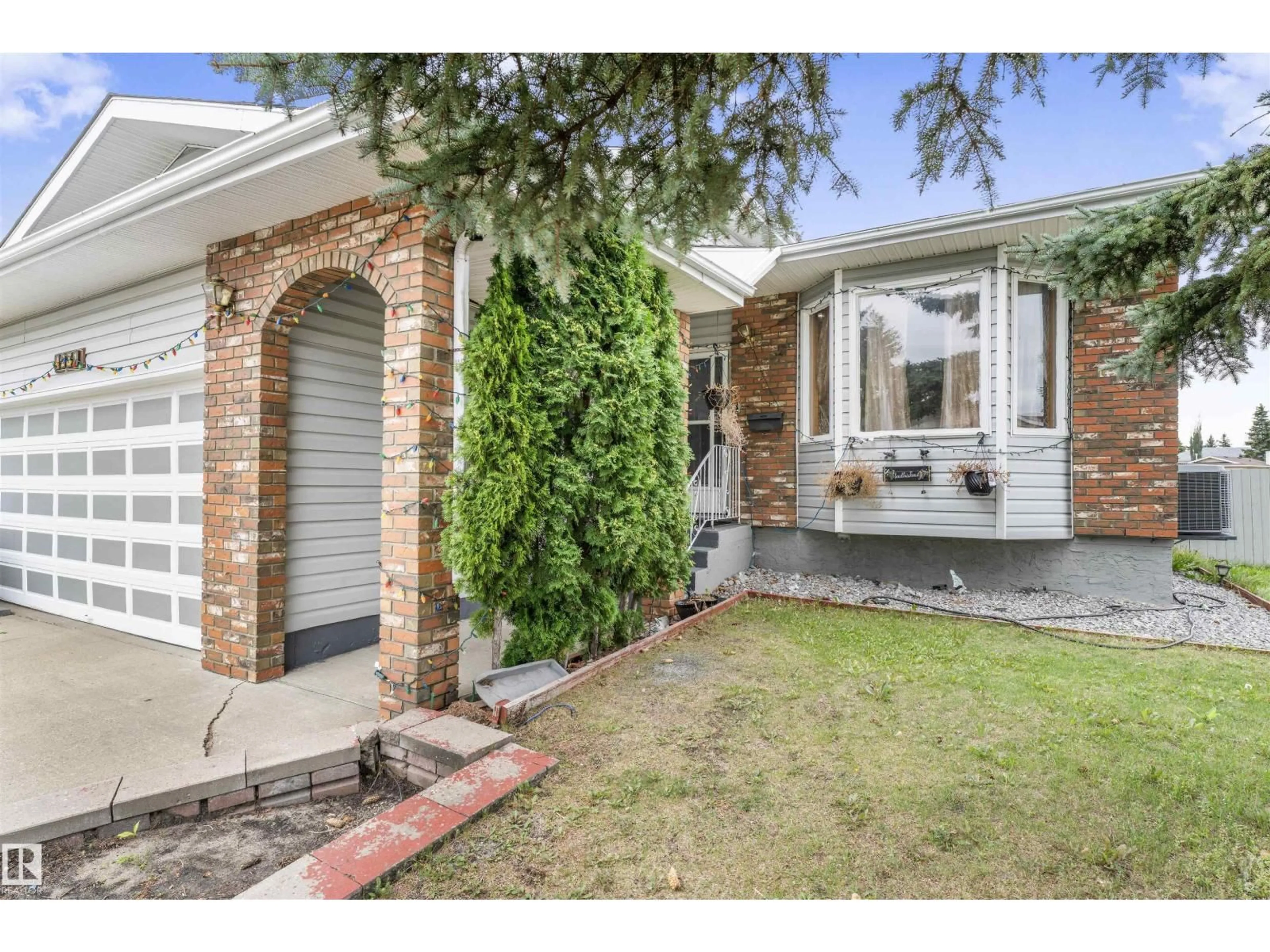 Home with brick exterior material, street for 4231 32 AV, Edmonton Alberta T6L3W5