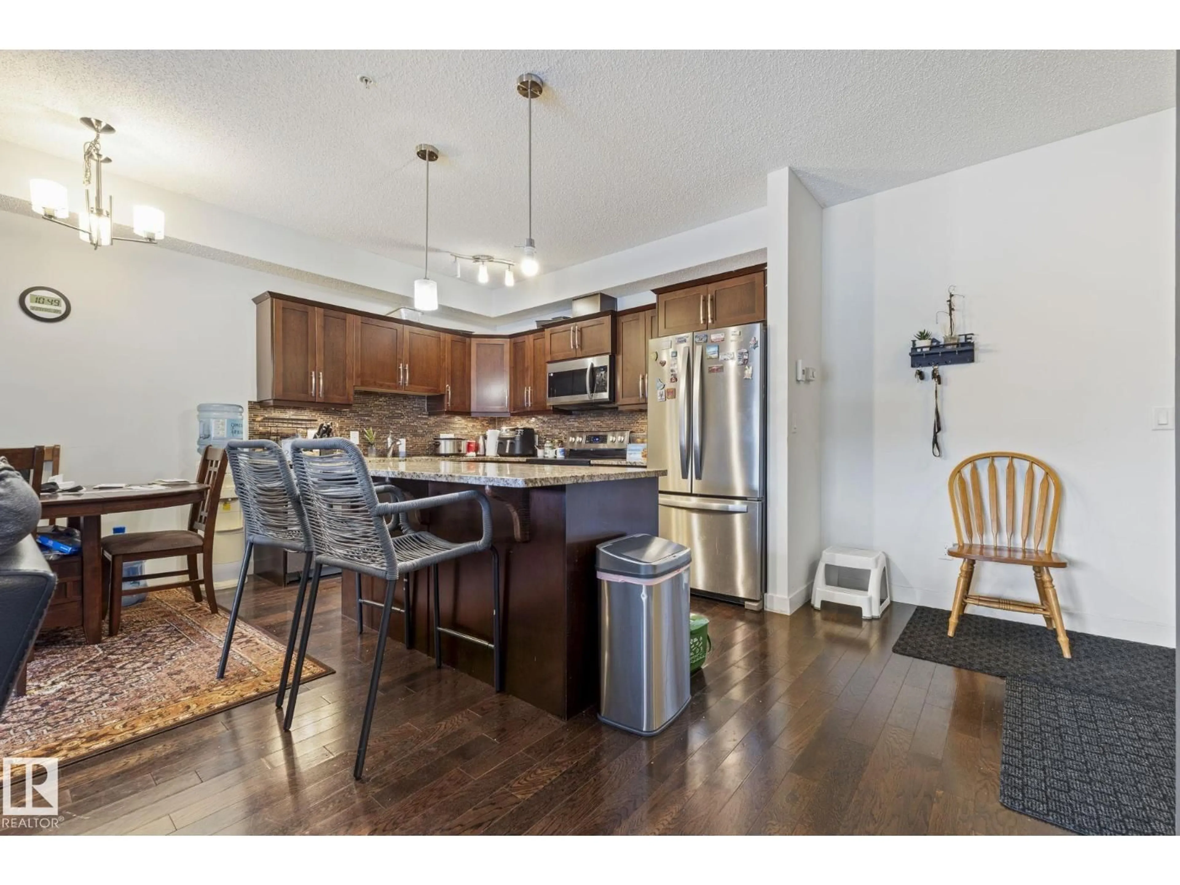 Open concept kitchen, unknown for #214 - 10530 56 AV, Edmonton Alberta T6H0X7