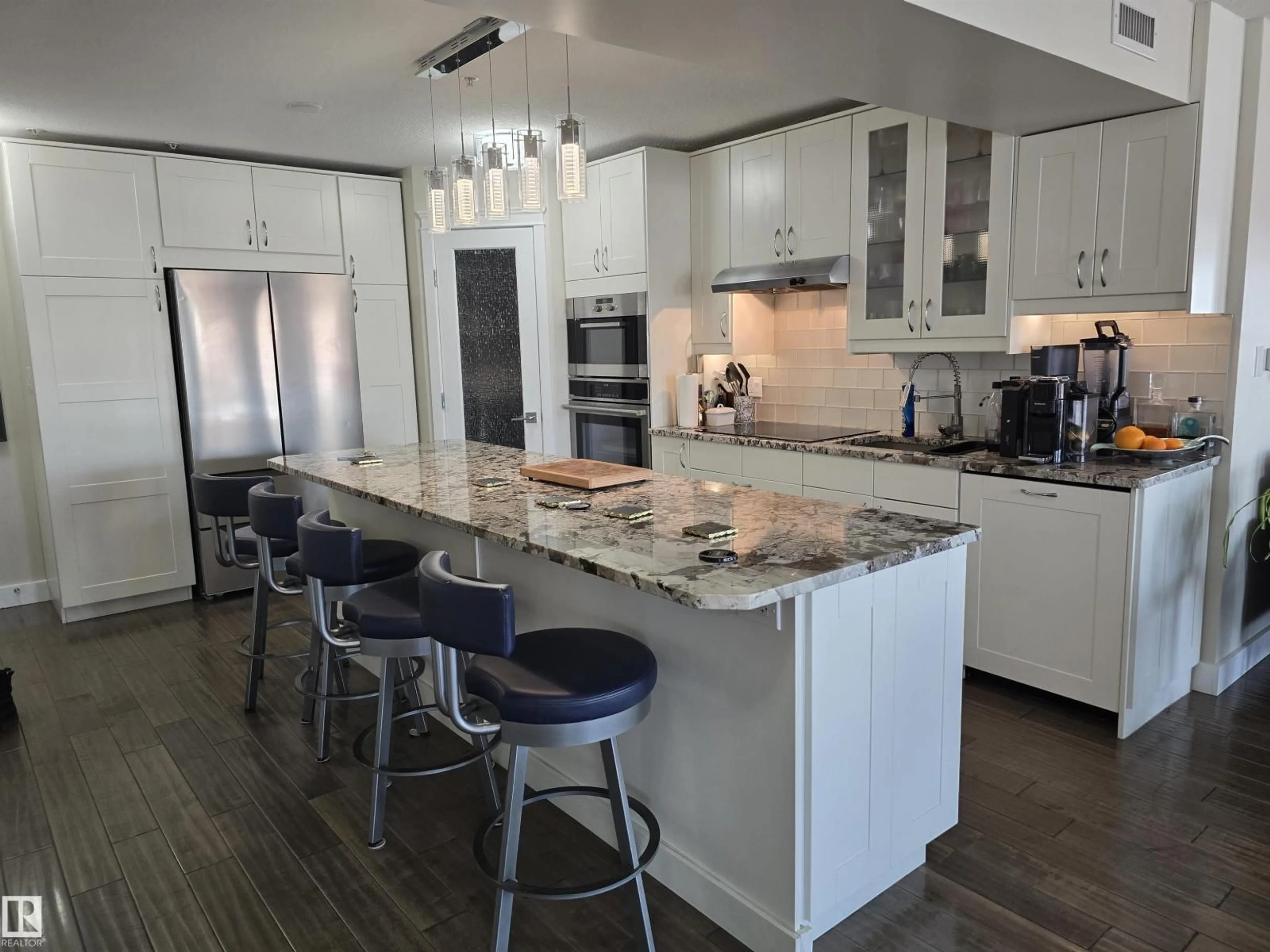Open concept kitchen, ceramic/tile floor for #404 - 10311 111 ST, Edmonton Alberta T5K2Y8