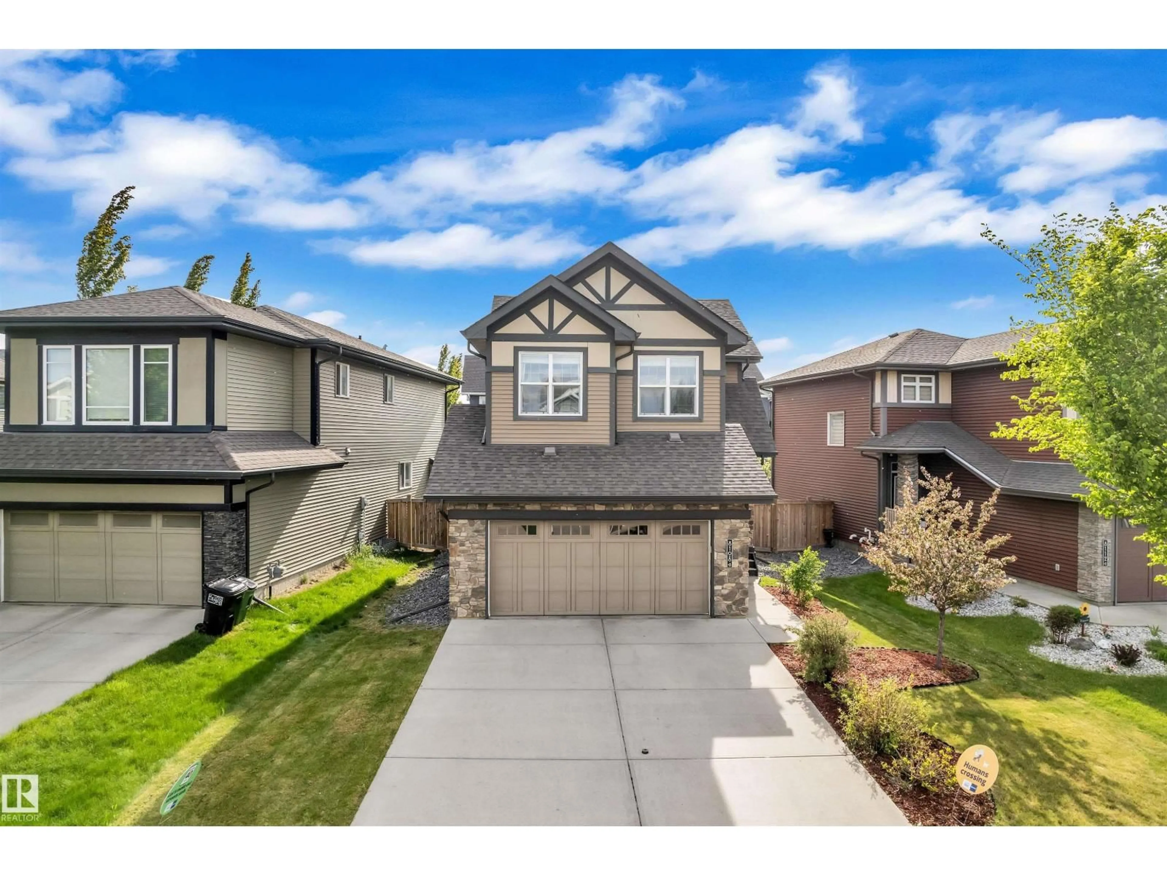 Home with vinyl exterior material, street for 8108 217 ST, Edmonton Alberta T5T4S1