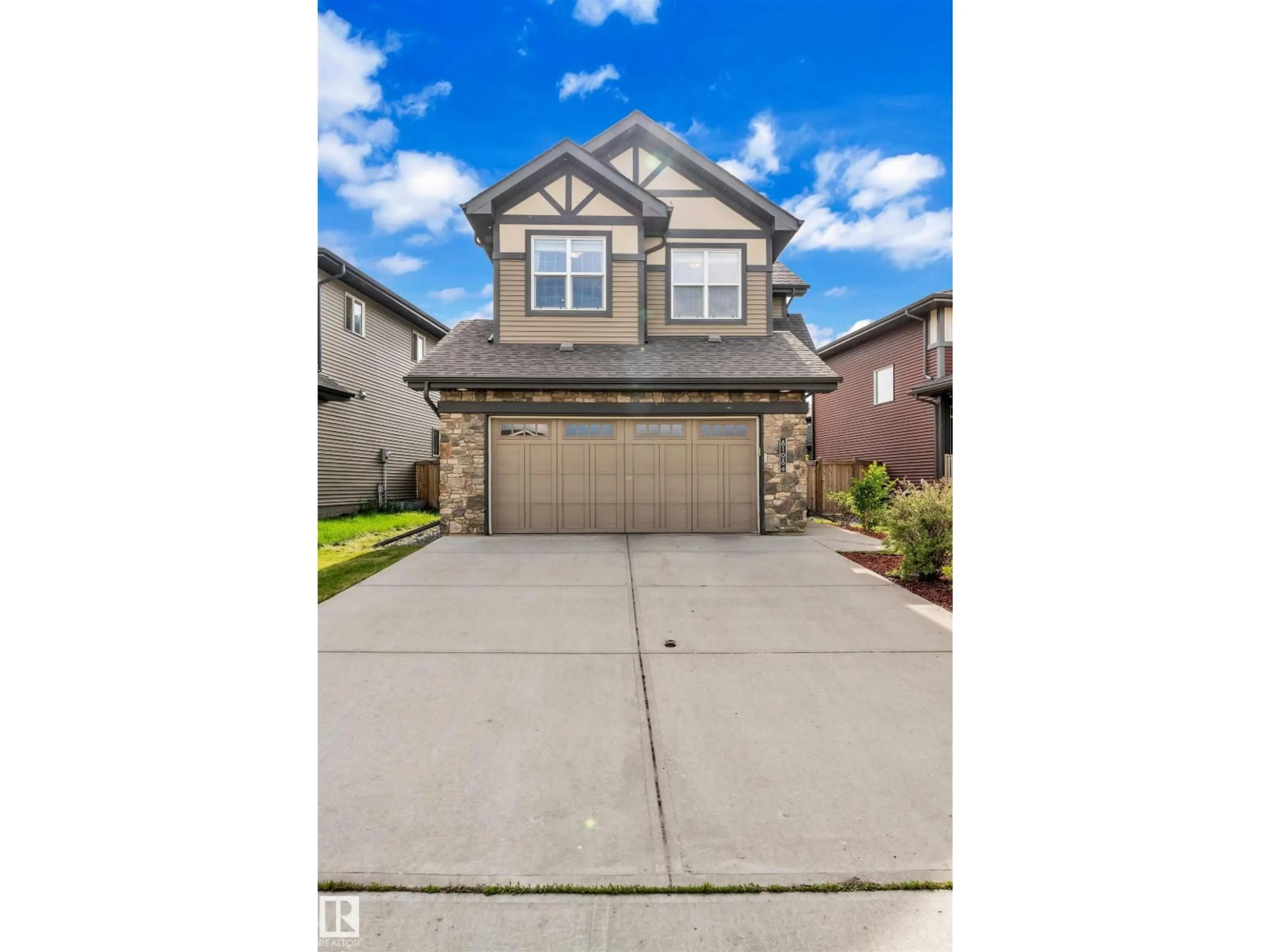 Home with vinyl exterior material, street for 8108 217 ST, Edmonton Alberta T5T4S1