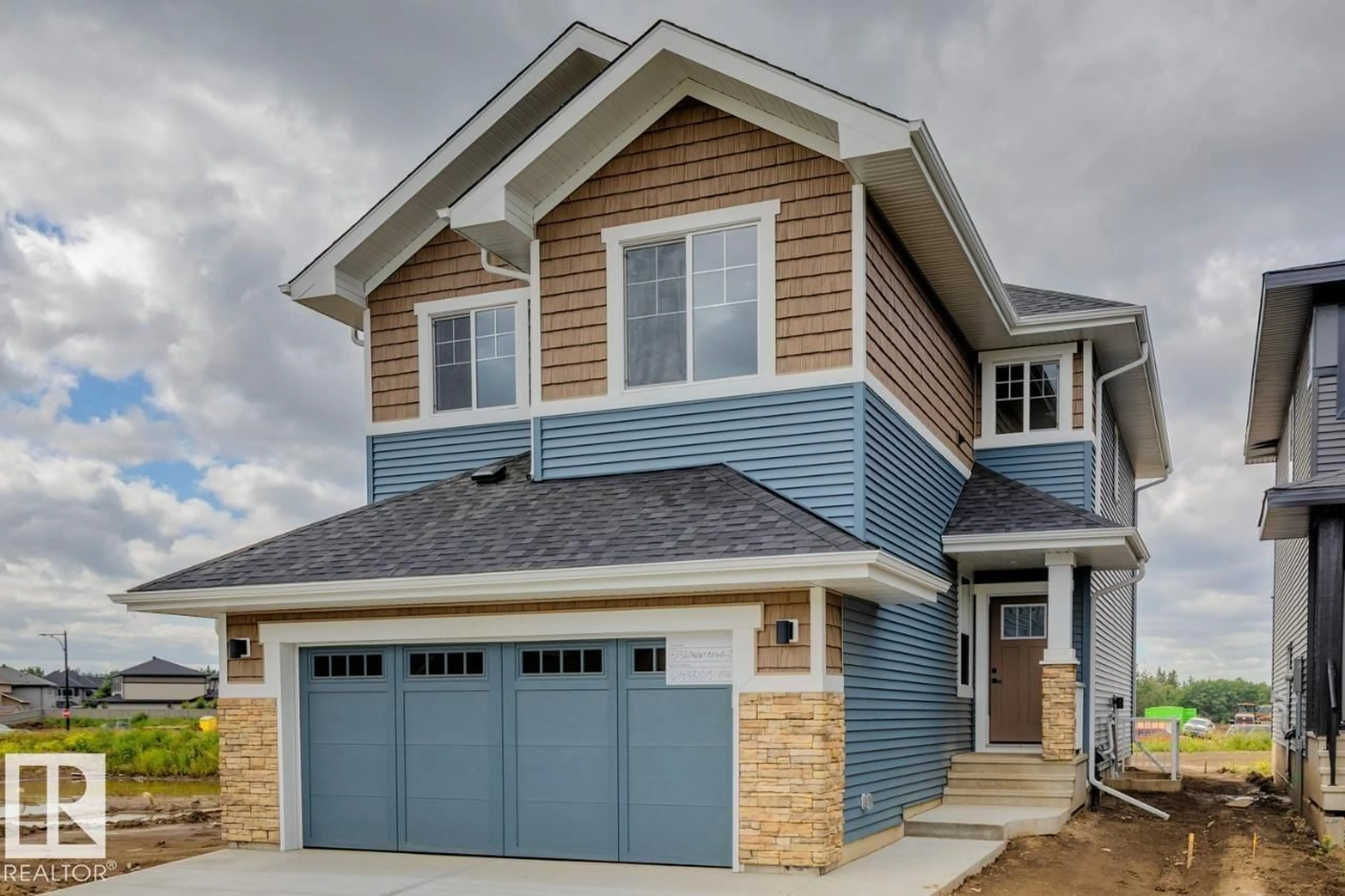 Home with vinyl exterior material, street for SW SW - 5132 CAWSEY BN, Edmonton Alberta T6W5M8