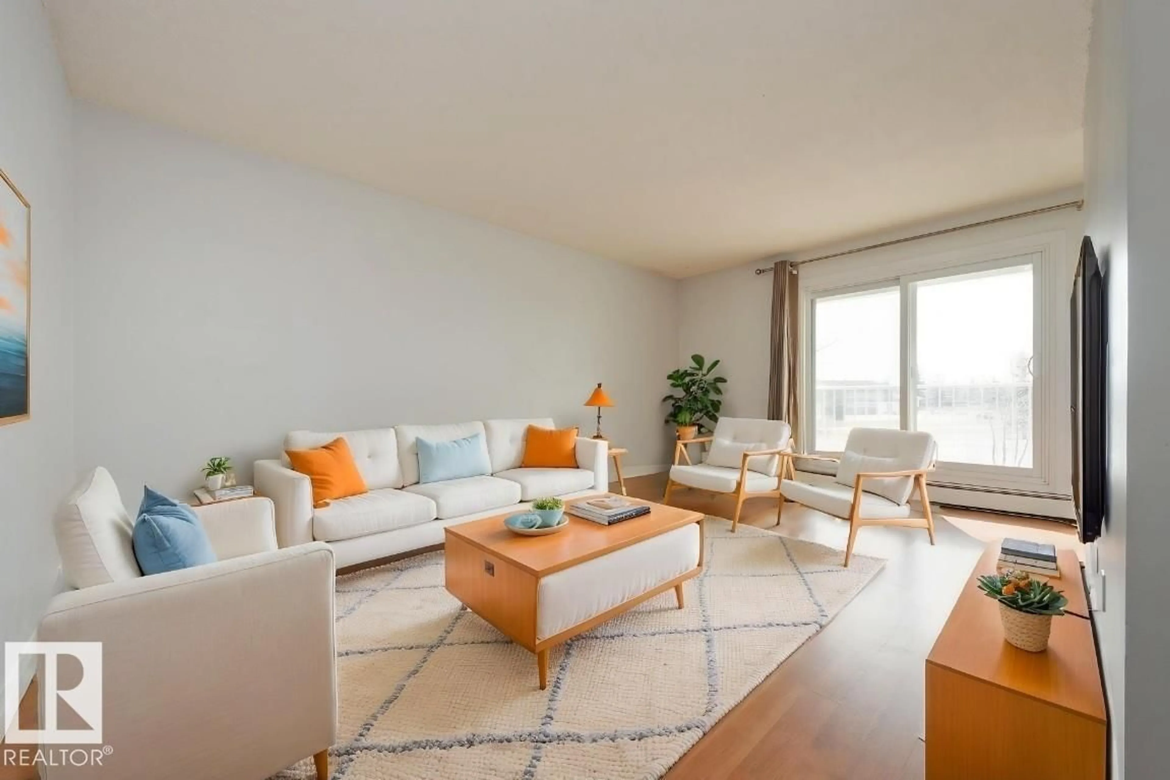 Living room with furniture, wood/laminate floor for 46 11265 31 AV NW, Edmonton Alberta T6J3V7