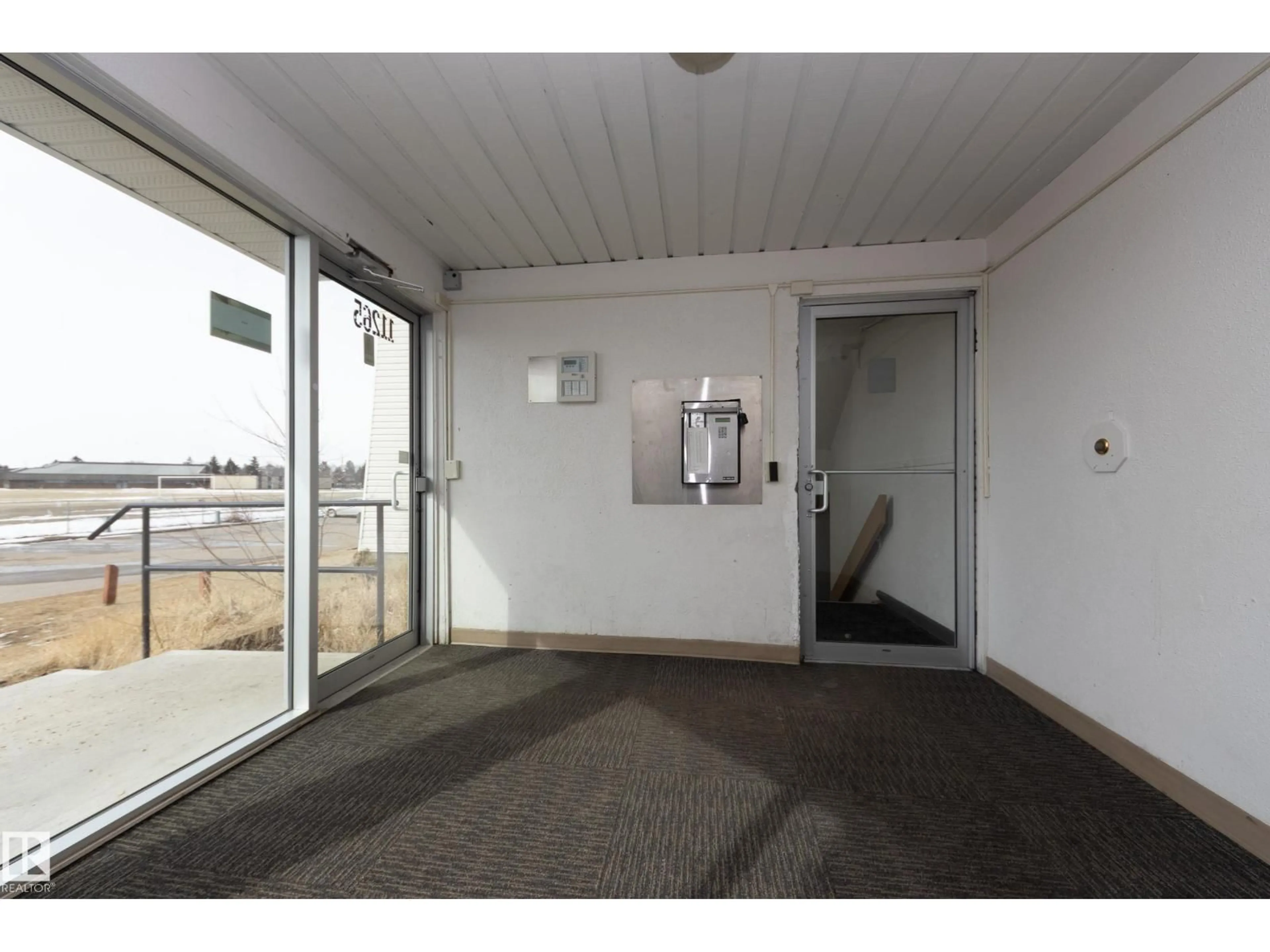 Indoor foyer for 46 11265 31 AV NW, Edmonton Alberta T6J3V7