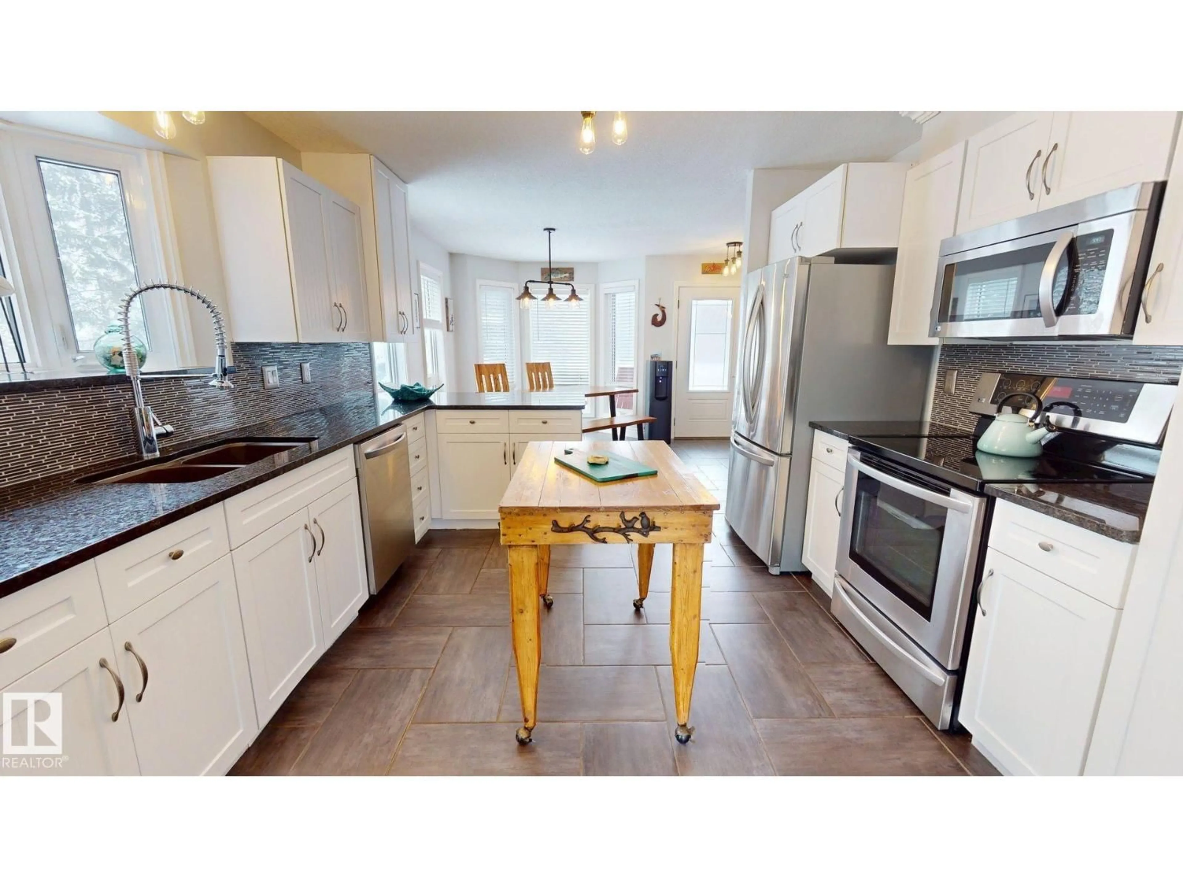 Open concept kitchen, ceramic/tile floor for 25B GOLDEN CR, Rural Leduc County Alberta T0C2P0